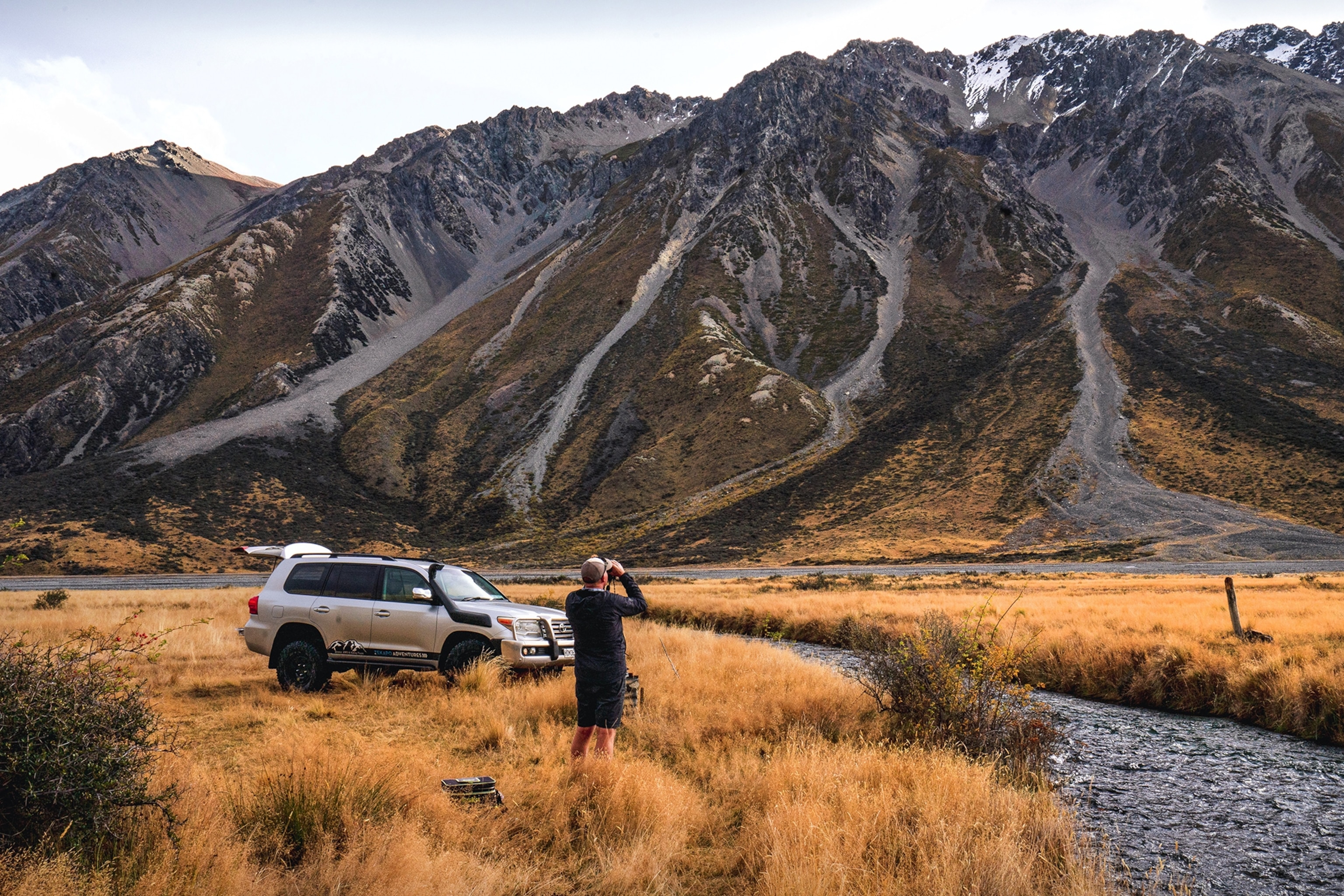 searching for birds in a mountainous landscape