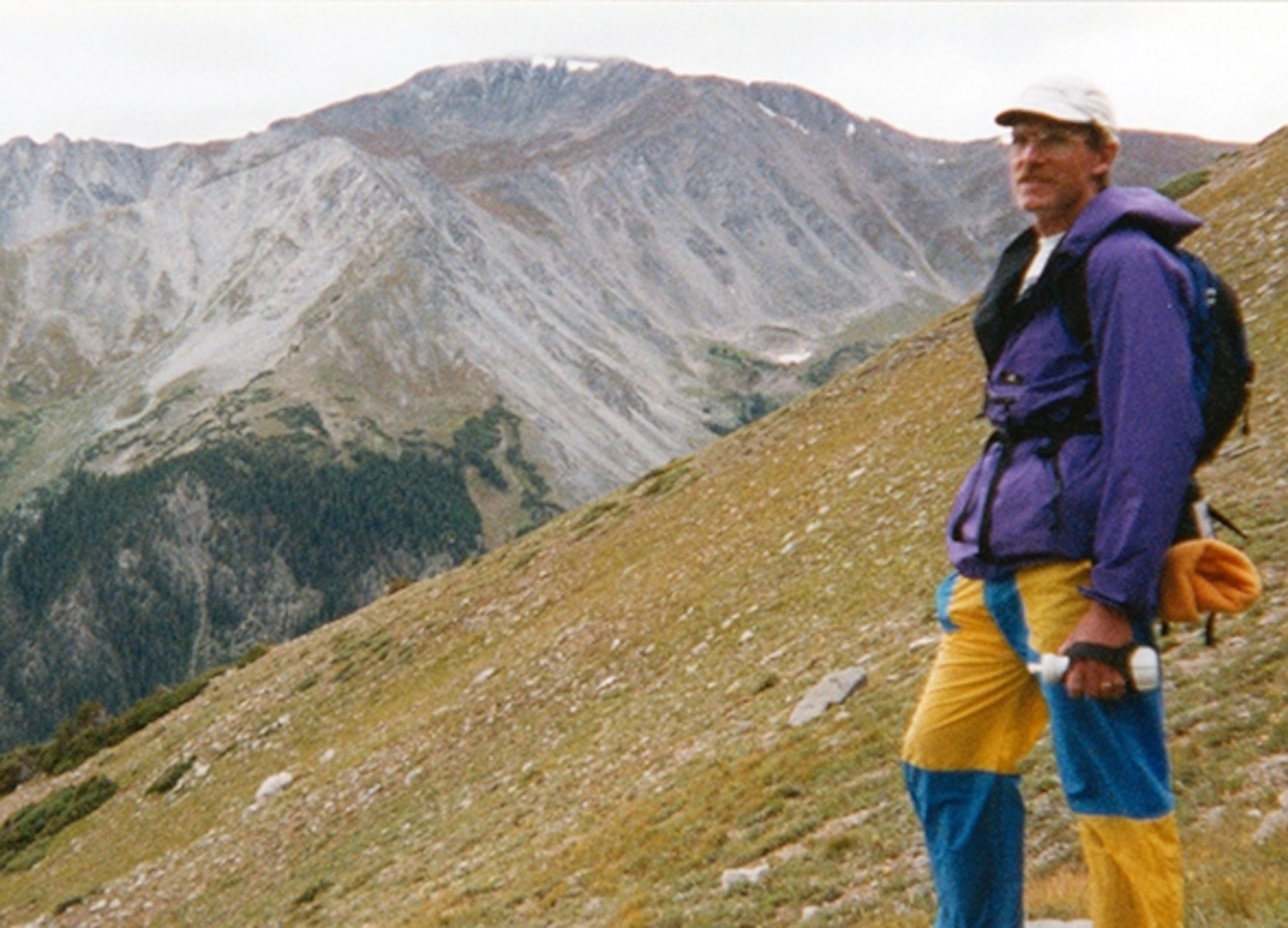 Blake Wood surveys the weather from Colorado's Mounta Columbia on the first Nolan's 14 attempt in 1999; Photograph by Gordan Hardman" width="590" height="300" /> Blake Wood surveys the weather from Colorado's Mounta Columbia on the first Nolan's 14 attempt in 1999; Photograph by Gordan Hardman