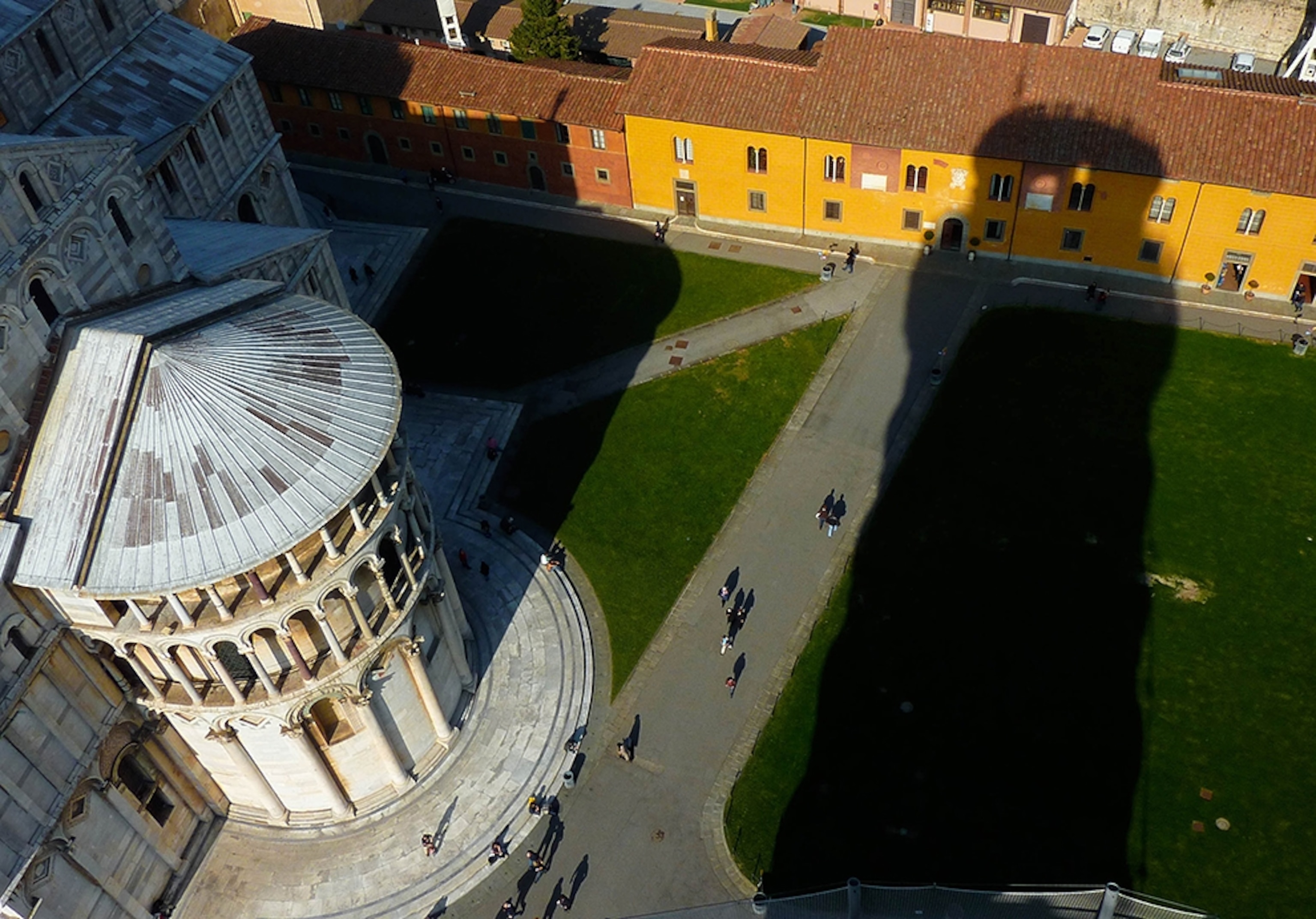 the shadow of the Leaning Tower of Pisa, Italy