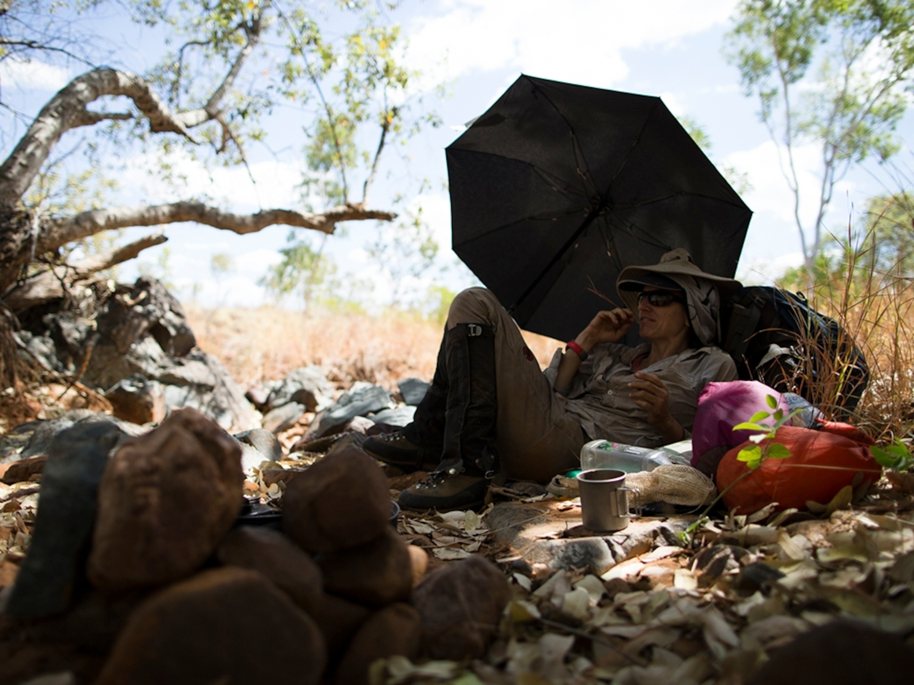 Sarah Marquis resting by her tent.