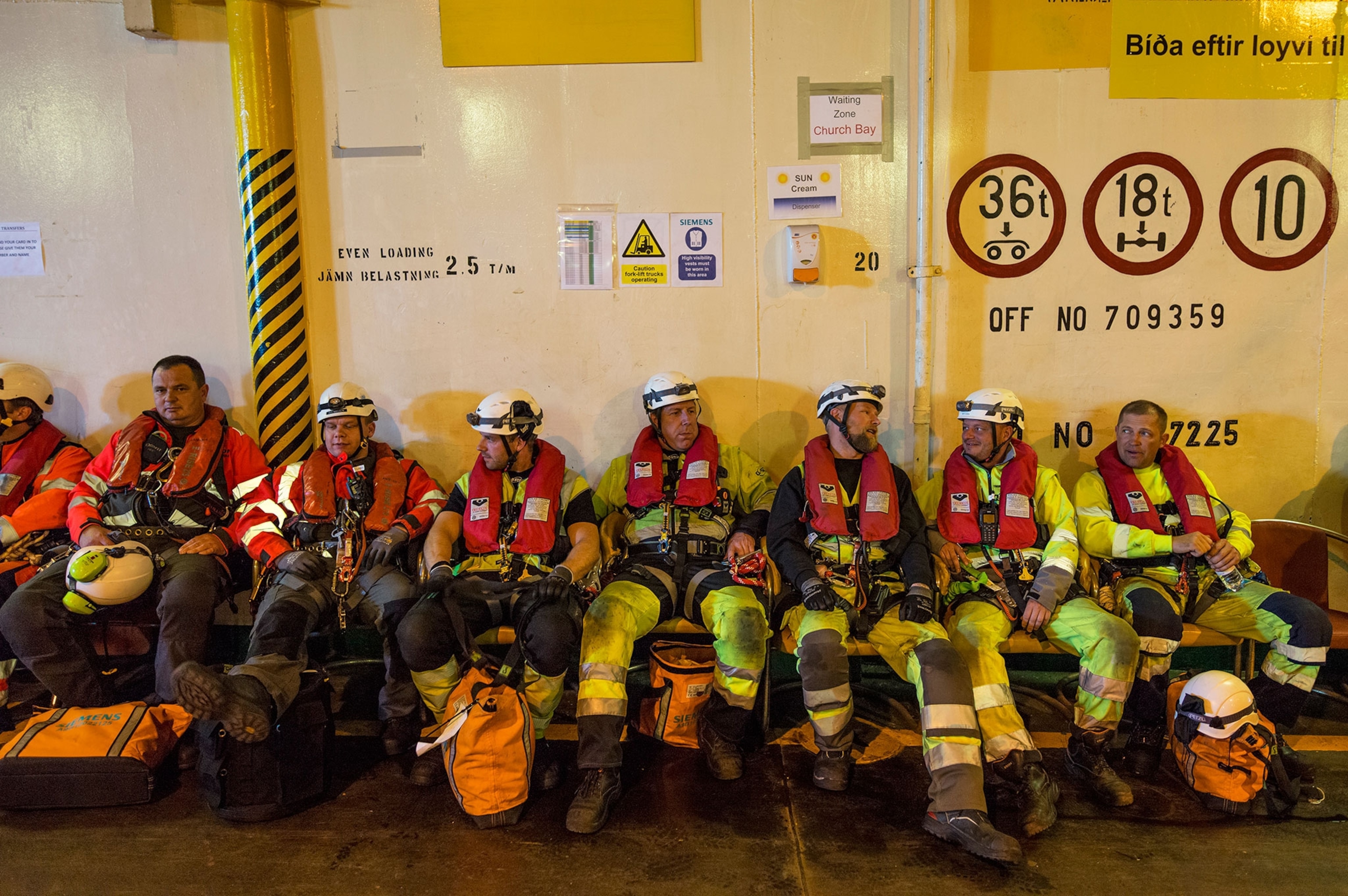 workers waiting for the ride to the wind turbines to begin work aboard the Regina Baltica.