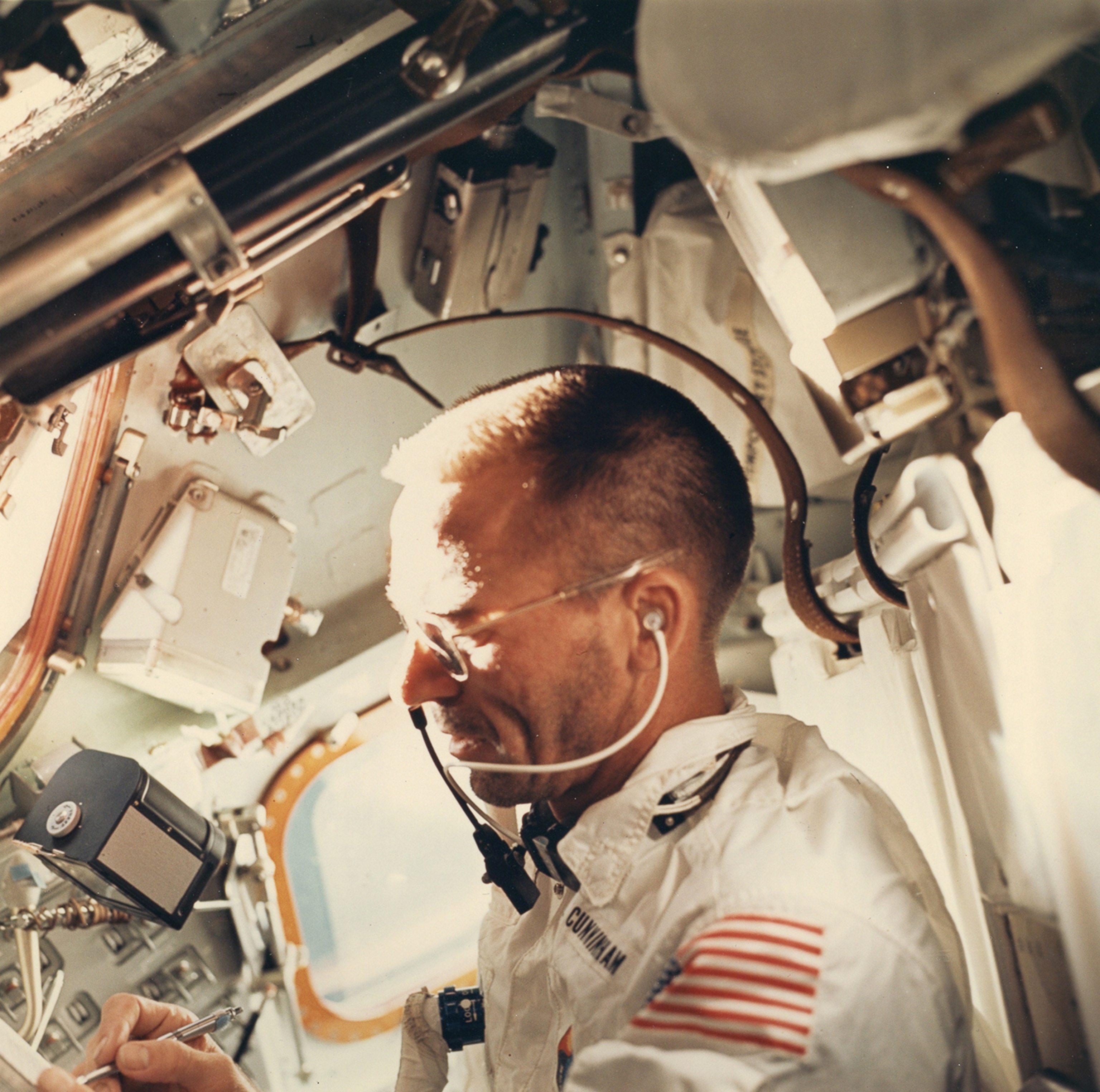 Water Cunningham aboard the Apollo 7