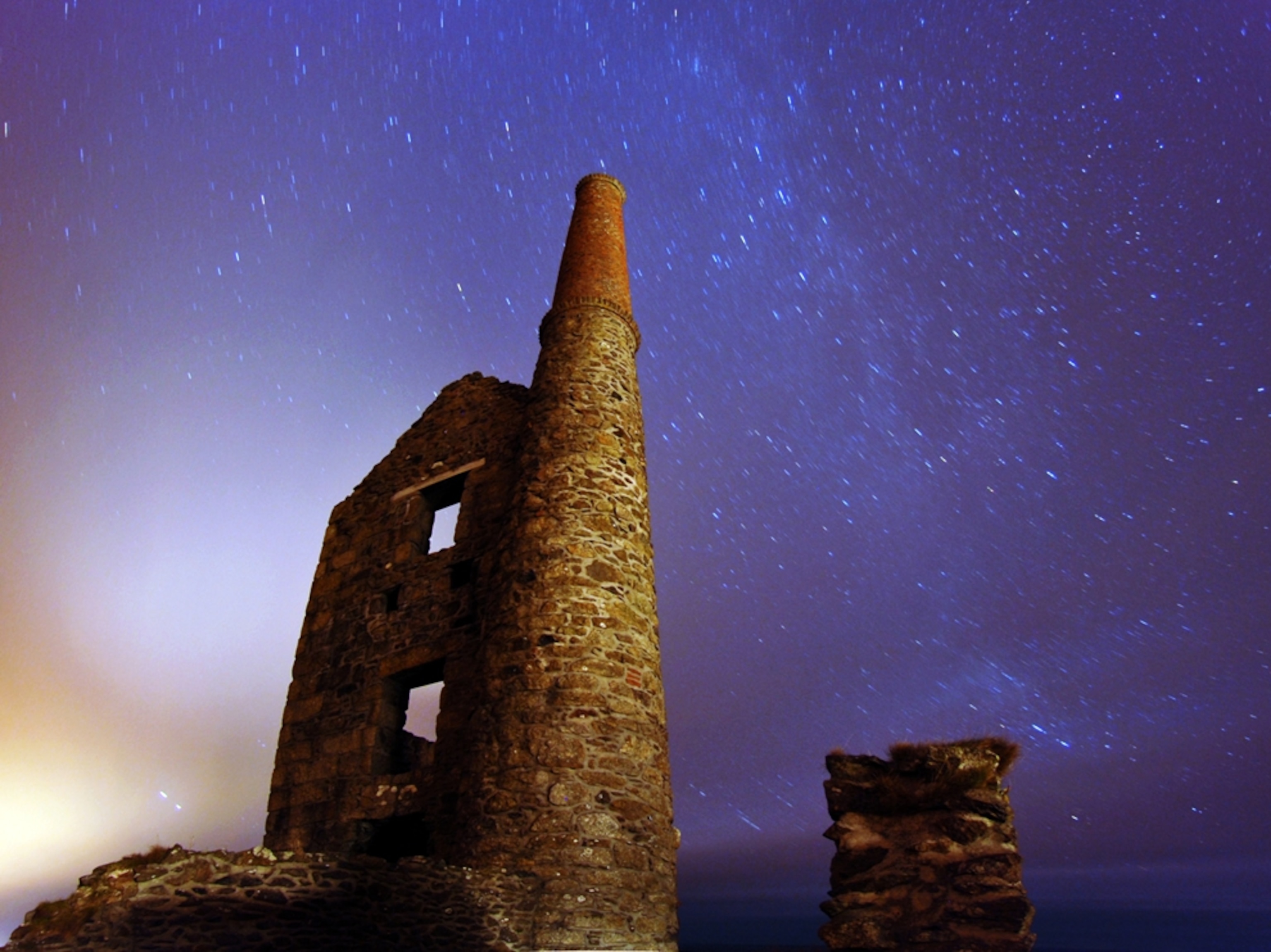 Purple night sky over World Heritage site in Cornwall England