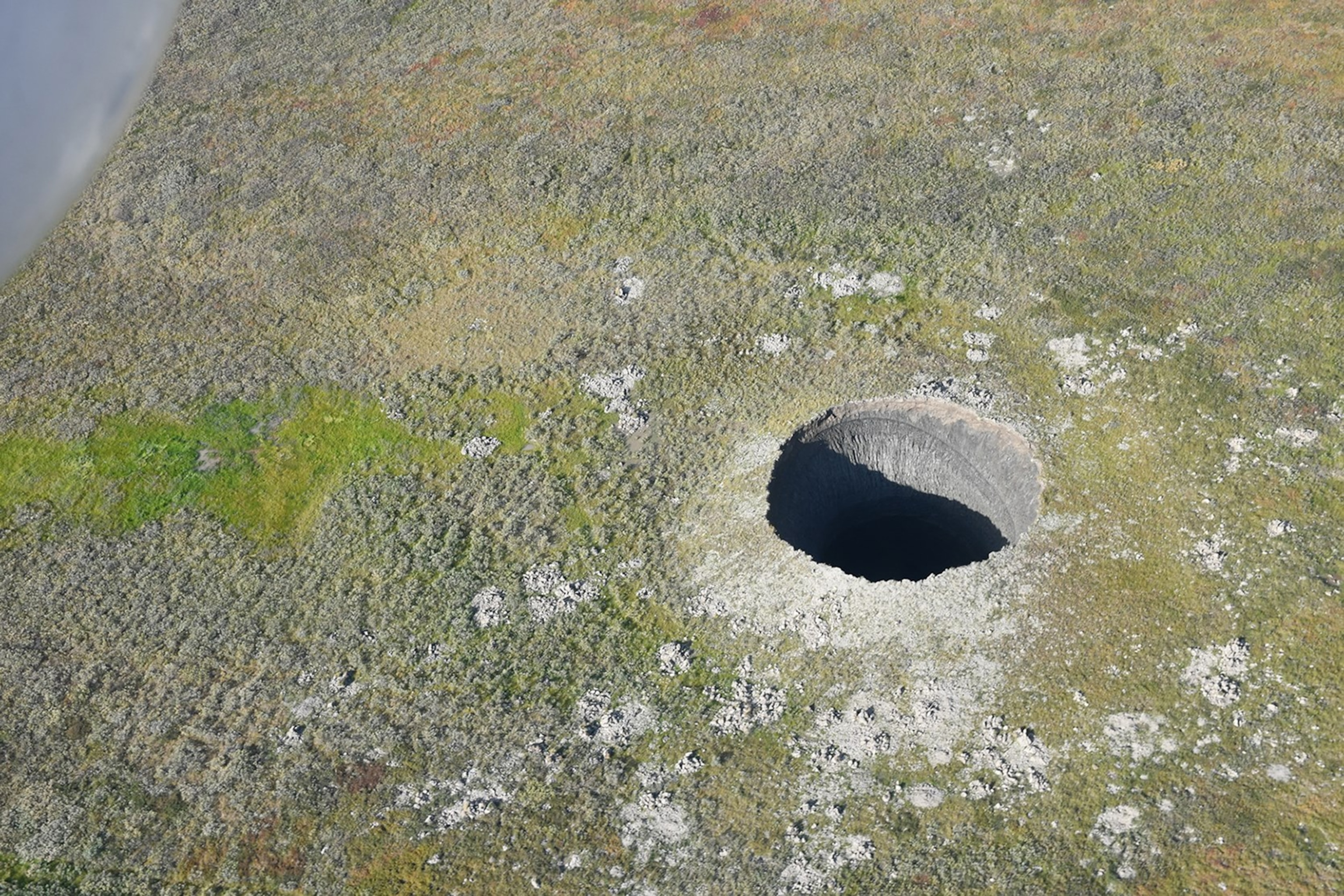 aerial photograph of hole in the ground.