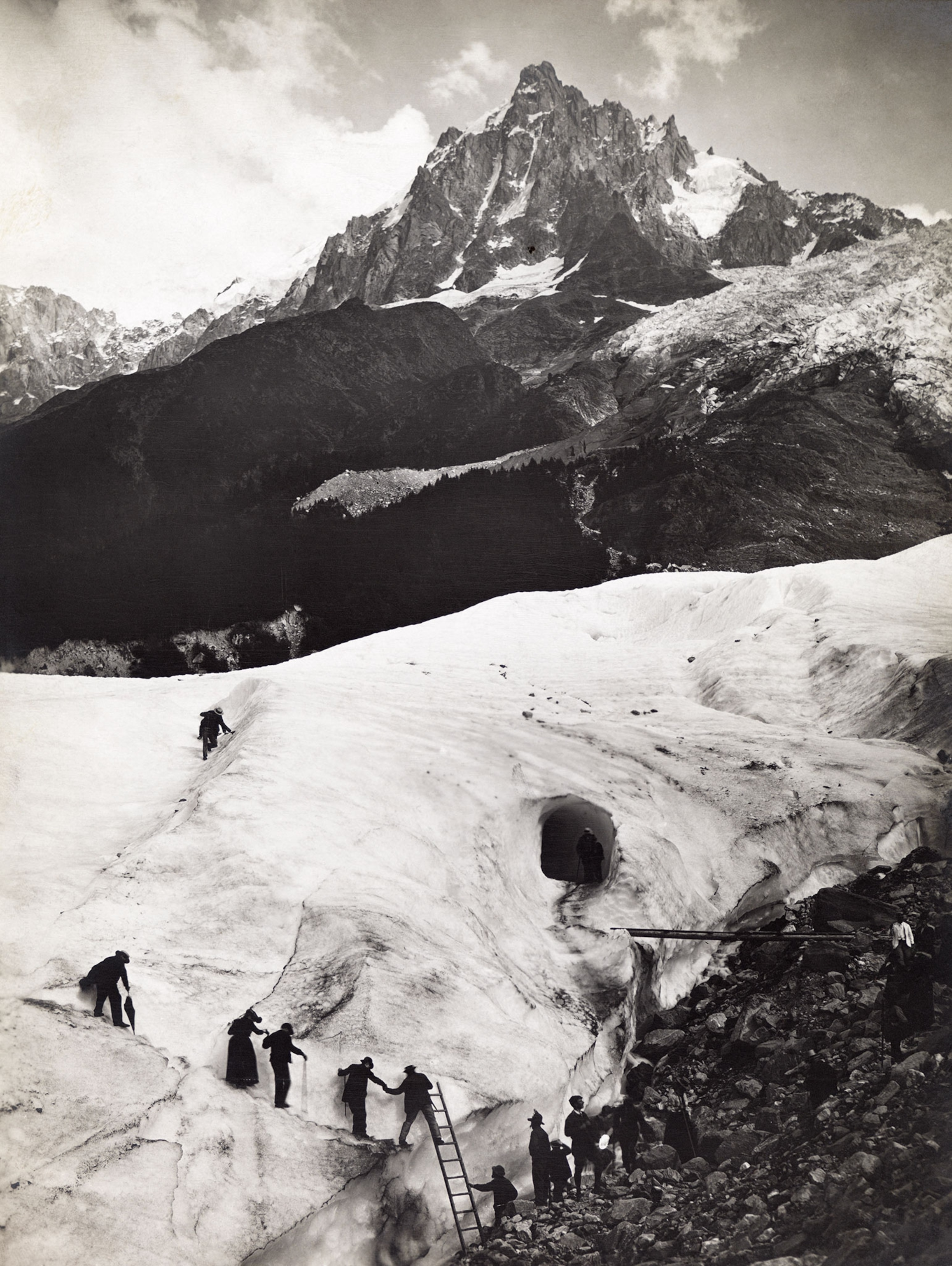 tourists climbing Glacier des Bossons in France