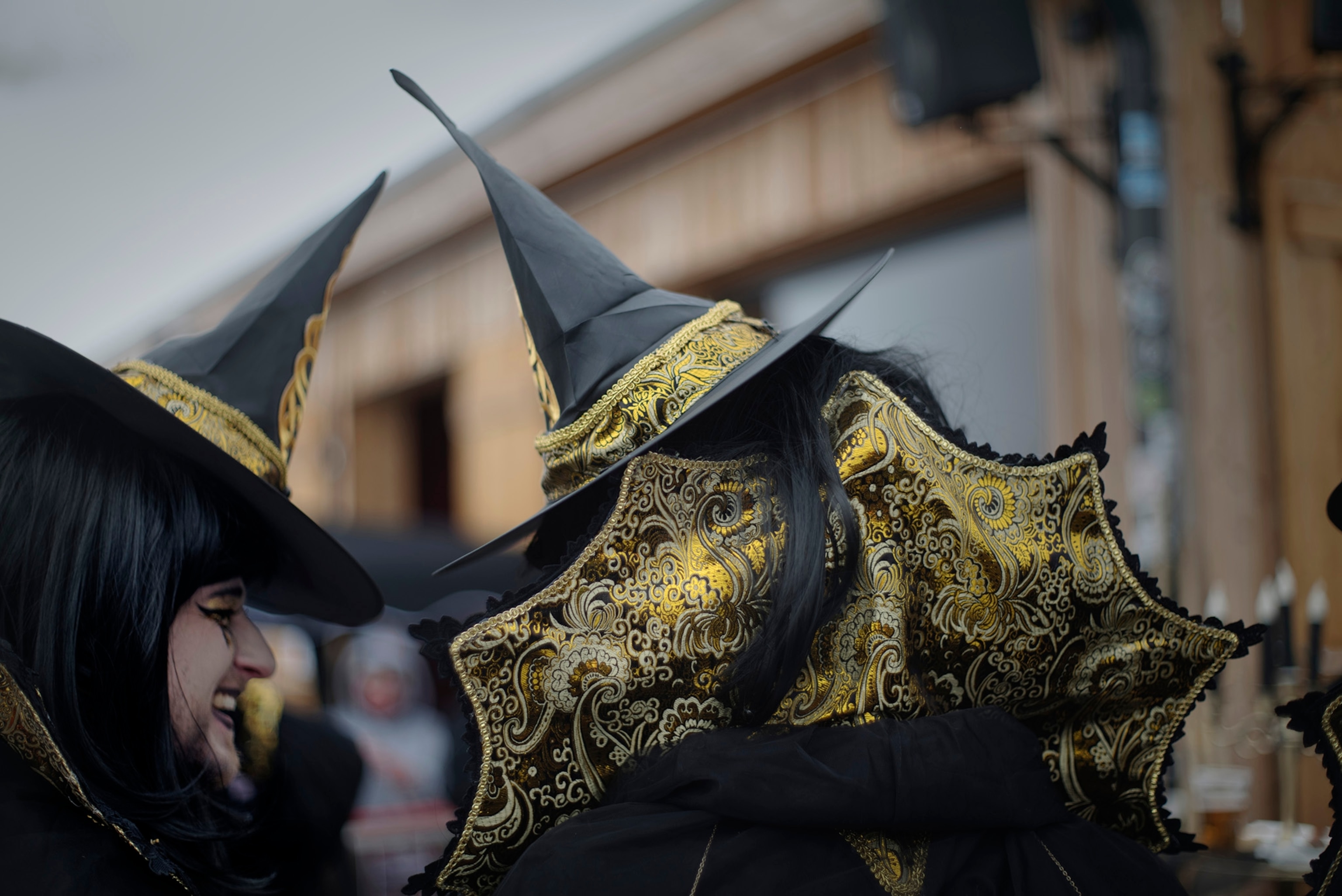 Skiers dressed as witches gather outside the Hexenbar (Witches Bar) to socialize and drink before skiing downhill at Belalp Hexen festival in Belalp, Switzerland. The festival includes races and witch themed activities.