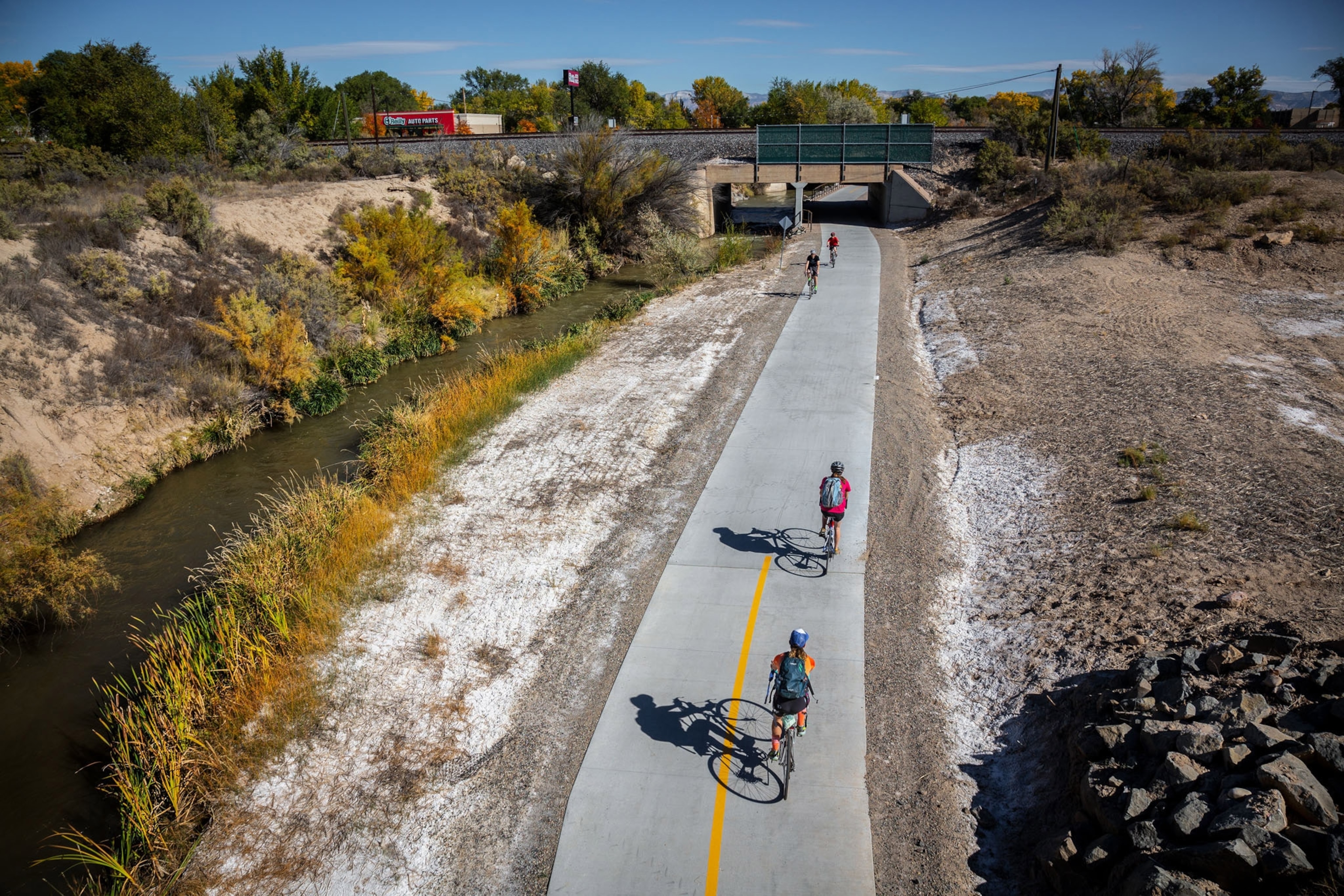 two cyclists on the riverfront trail outside of Fruita, Colorado
