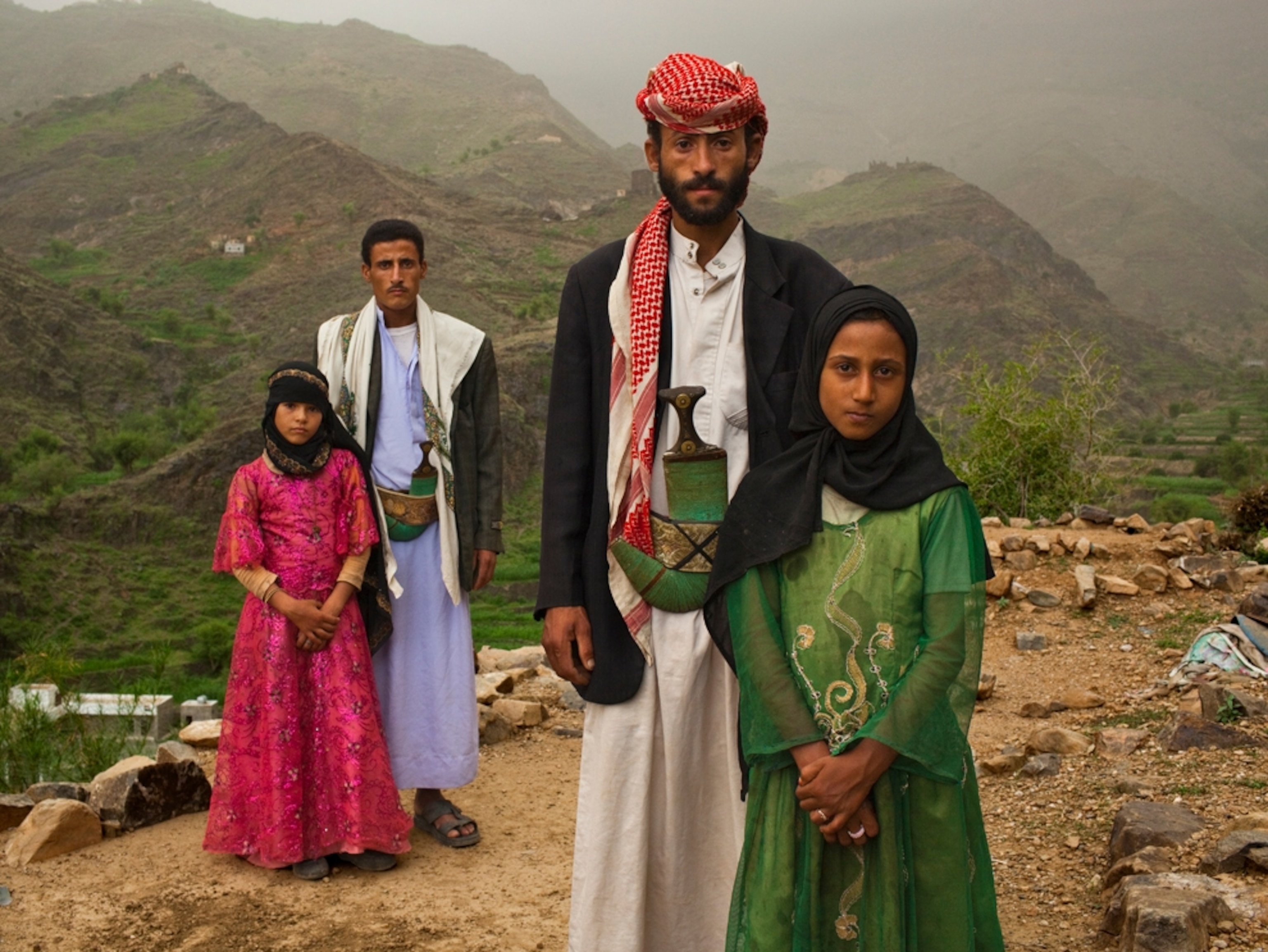 Preteen brides with their older Yemeni husbands
