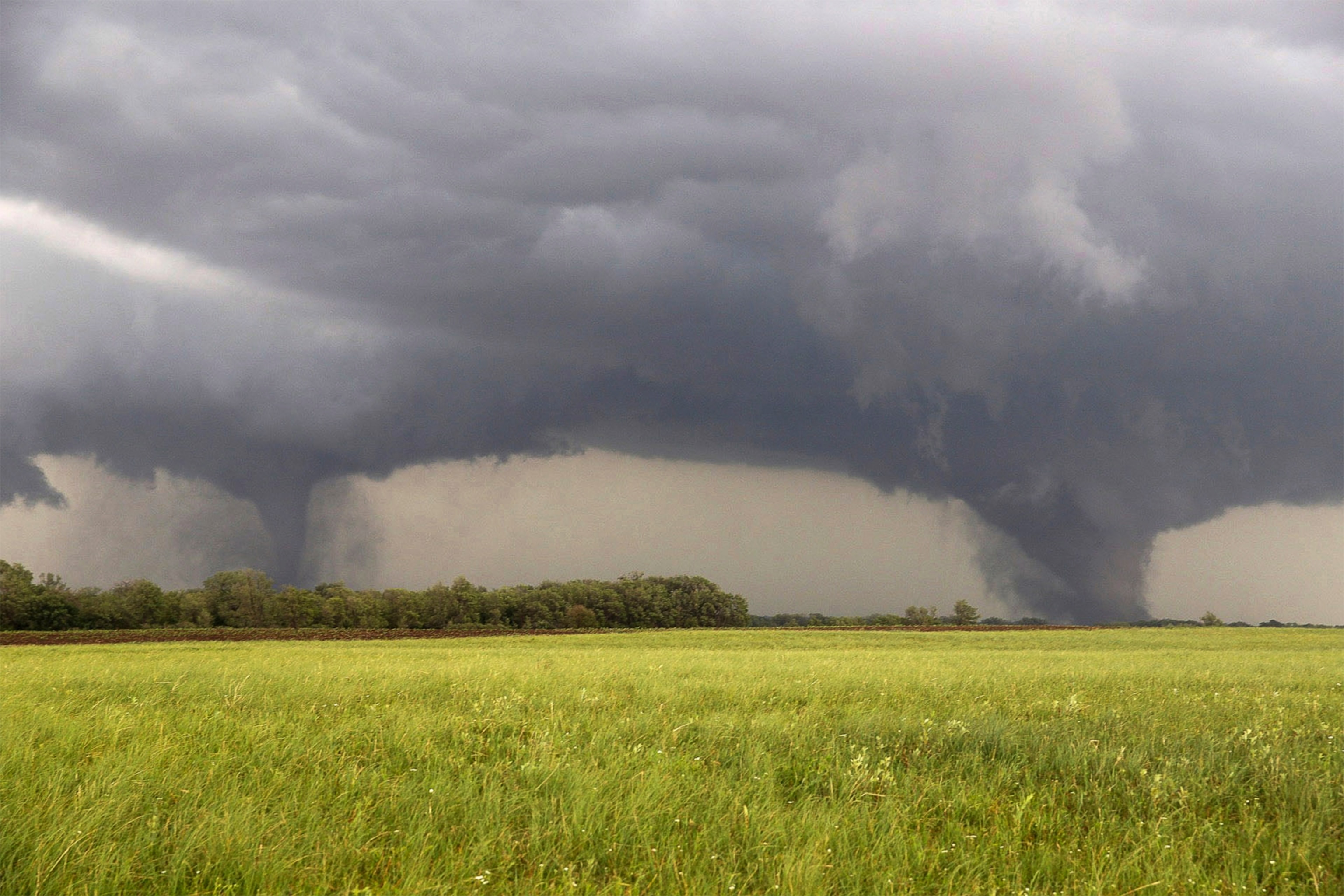 two twisters touching down in Pilger, Nebraska on June 16.