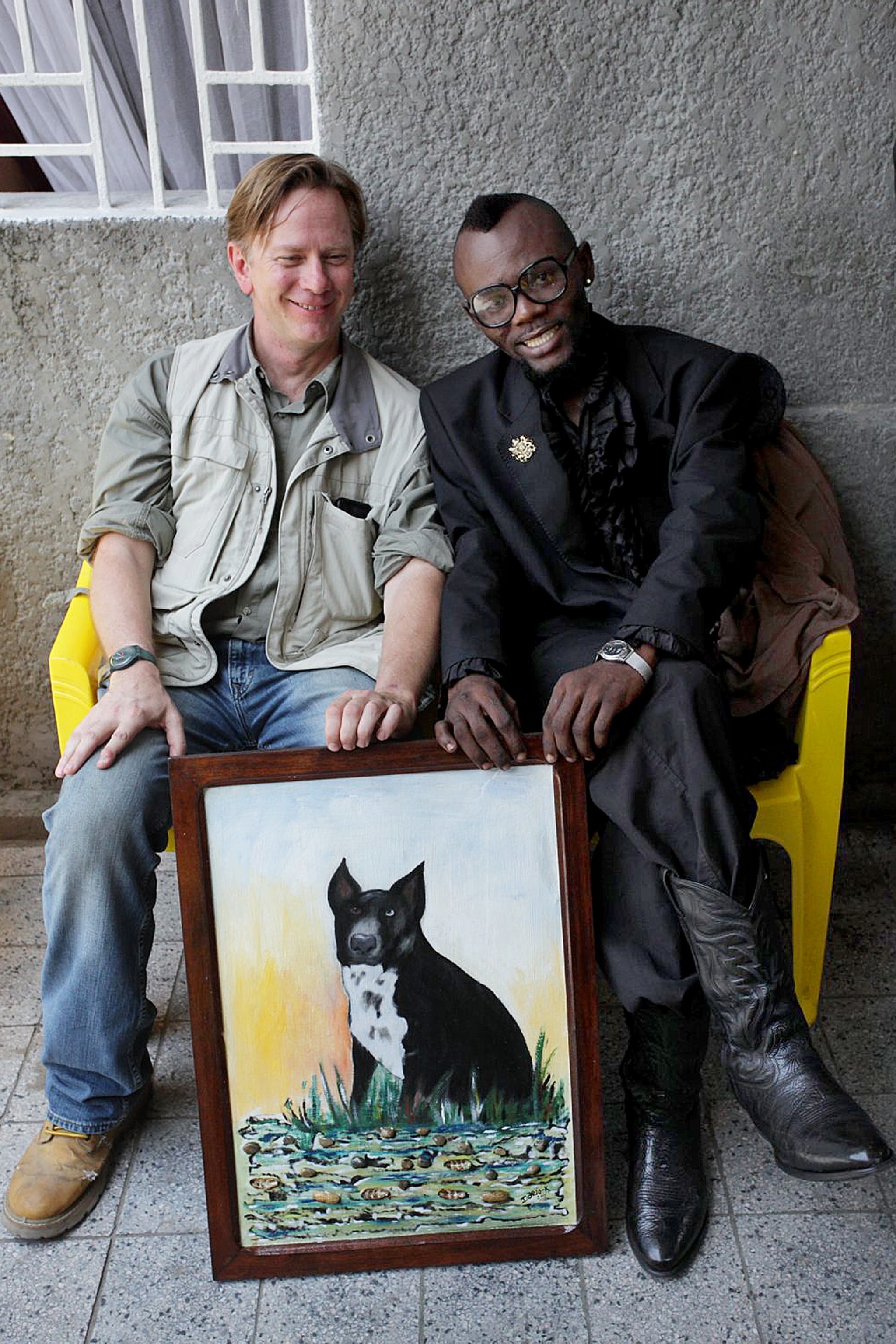 Robert Draper with Sapeur Artist Dario in Kinshasa
