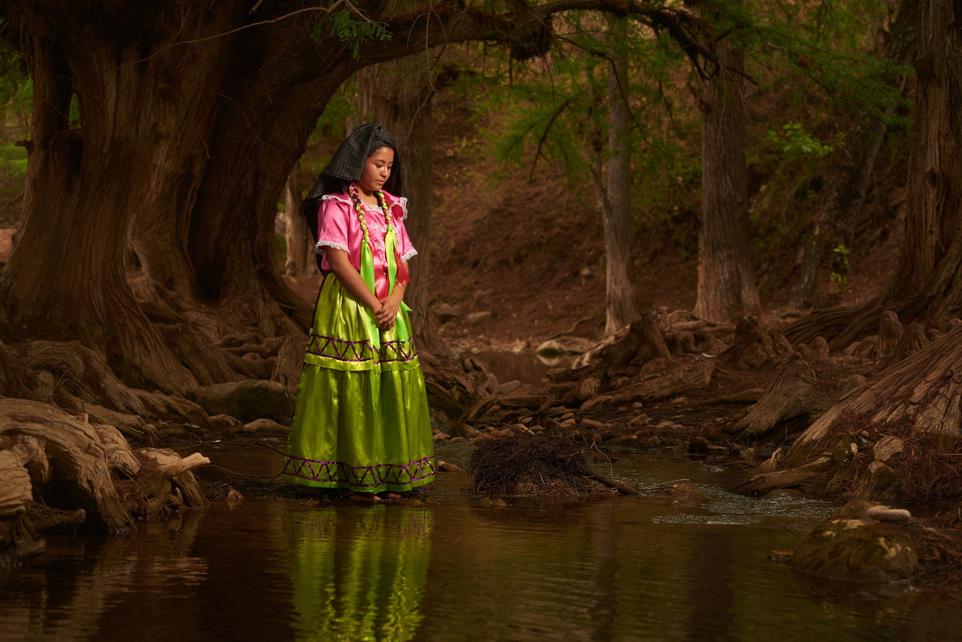 a woman wearing a traditional costume in Miahuatlan, Oaxaca, Mexico