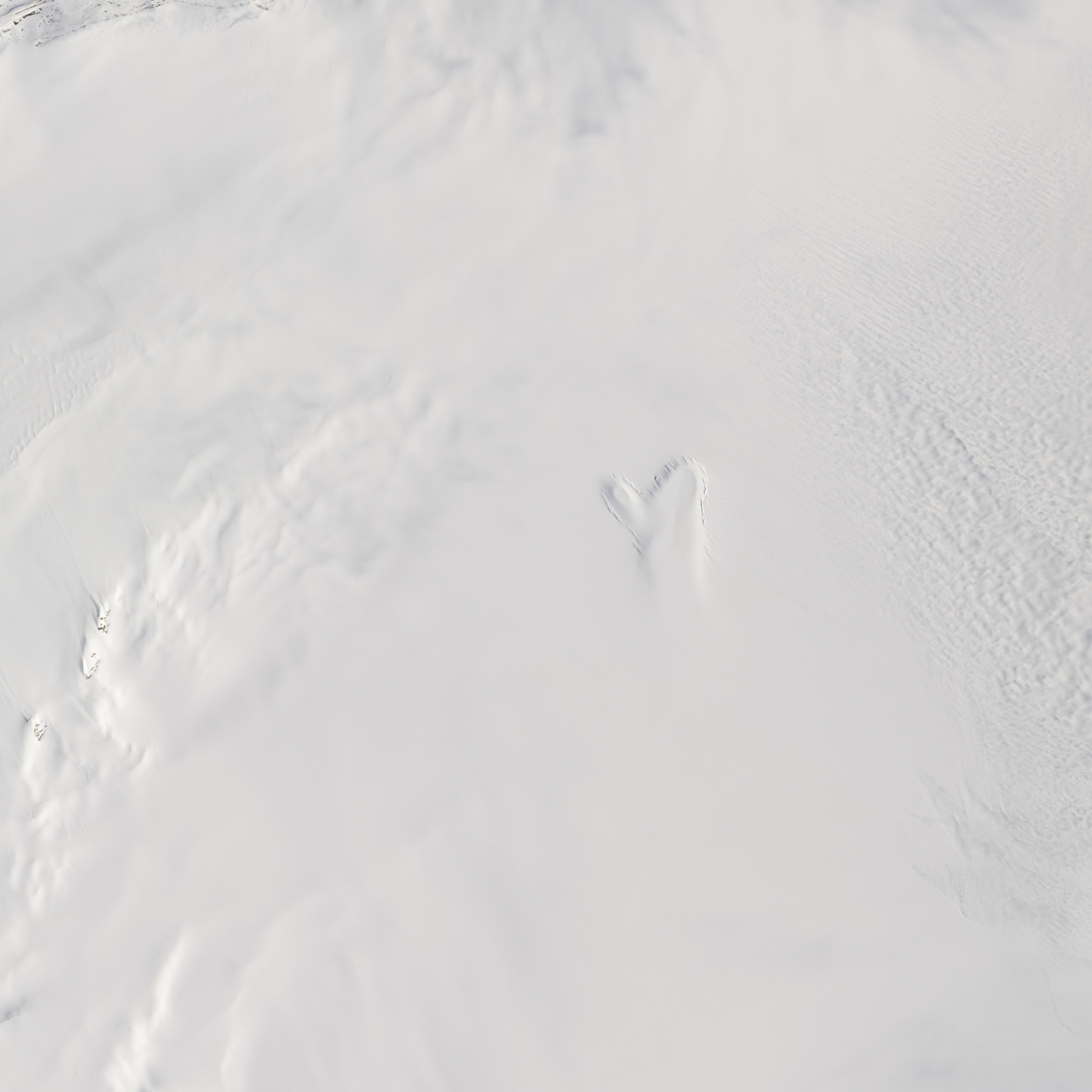 the shape of a mitten on the surface of the a Greenland ice cap