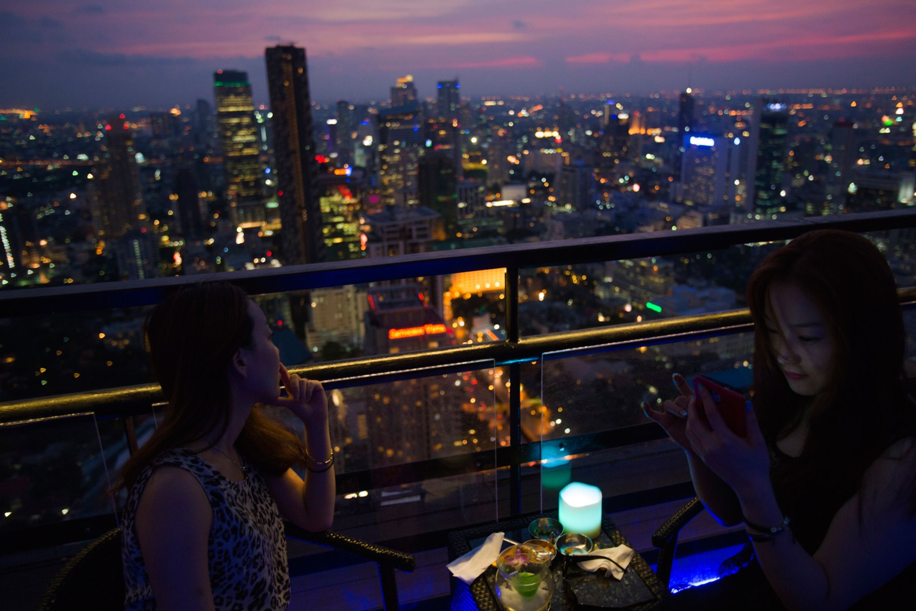 women at a restaurant in Bangkok.