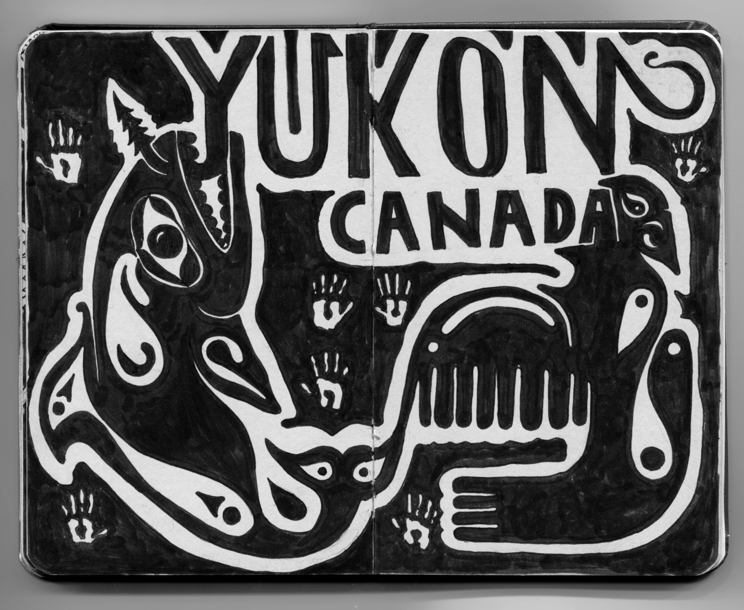 journal with tribal illustration