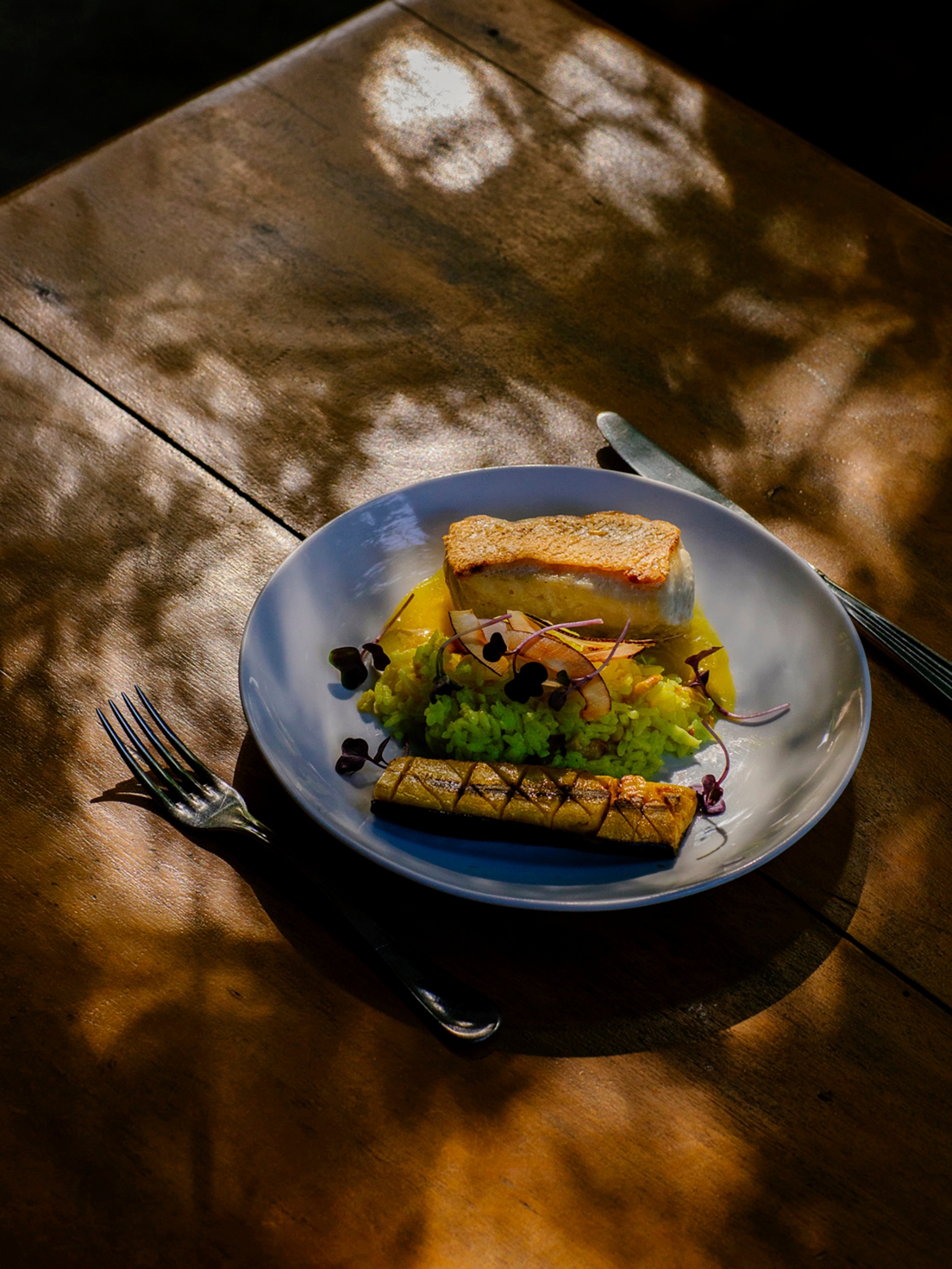 Rio de Janeiro, Brazil: At the Aprazível restaurant in Santa Teresa, one of the fish dishes with plantain.