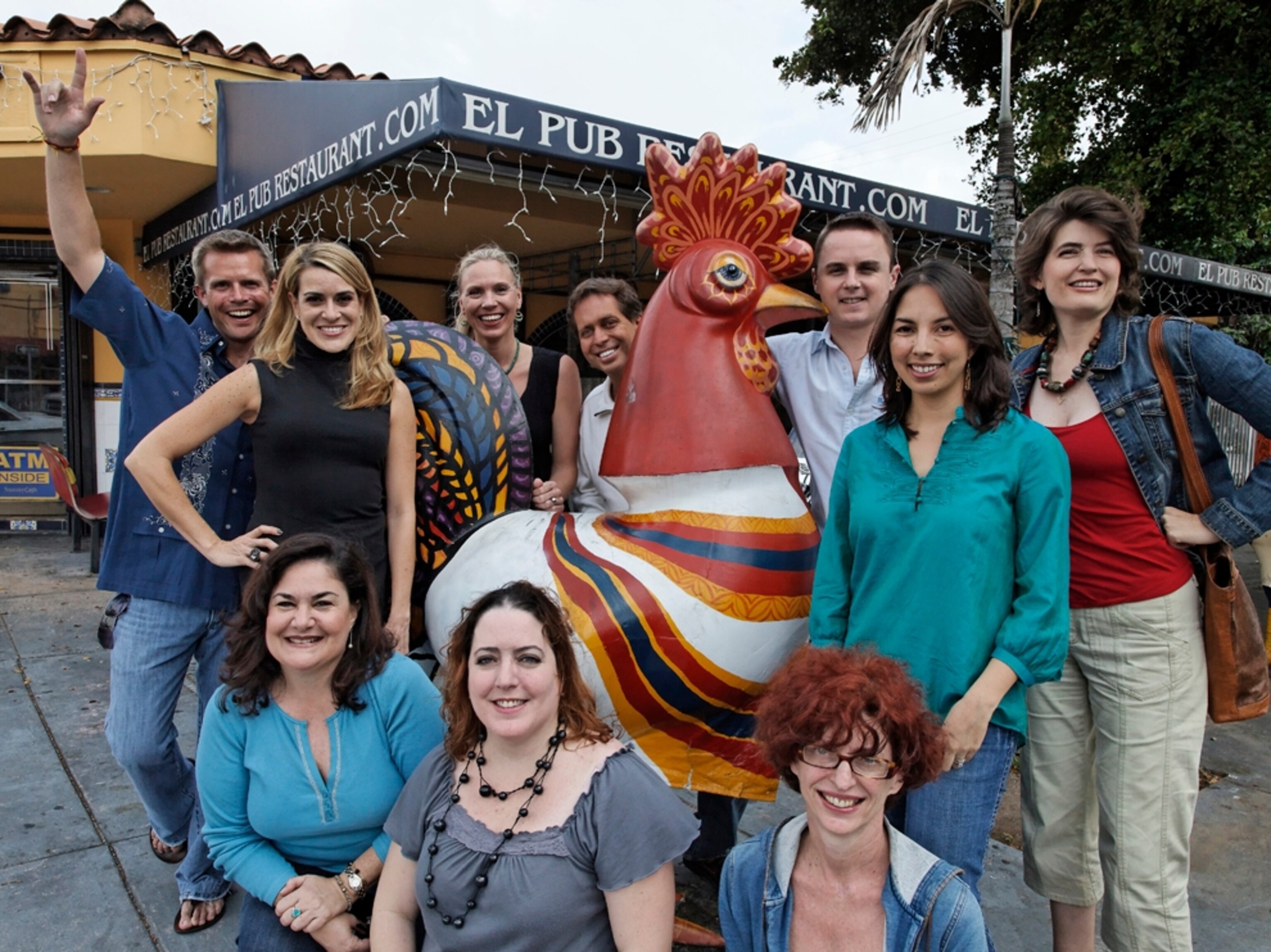 Twitter helpers gather around rooster sculpture, Miami
