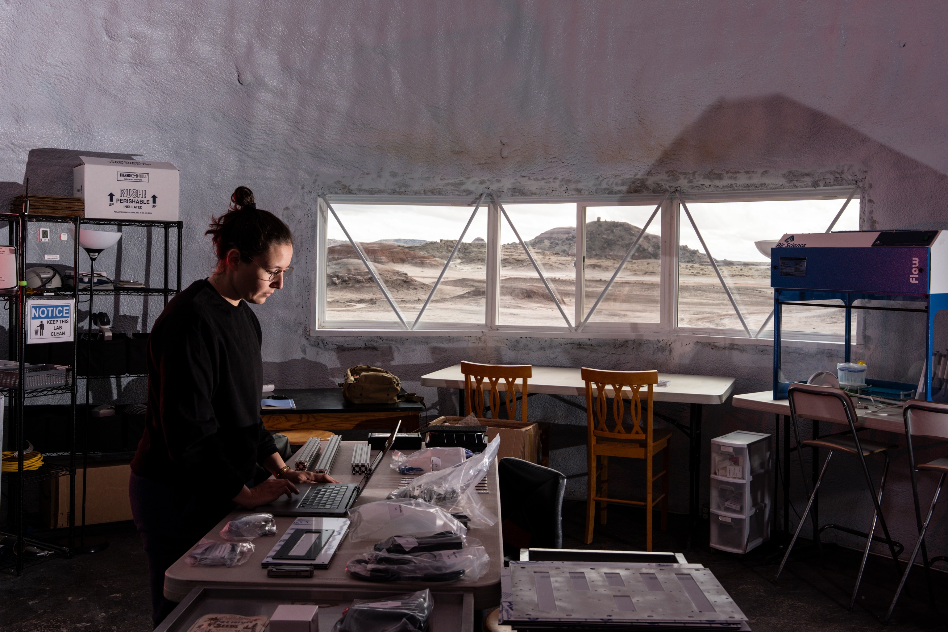 Crew Journalist Mackenzie Calle on Sol 2 at Mars Desert Research Station outside of Hanksville, Utah on October 14, 2025. She is beginning to assemble Spaceseed, a cabinet that will grow microgreens to simplify the growing process for analog astronaut crews and future astronauts in space.
