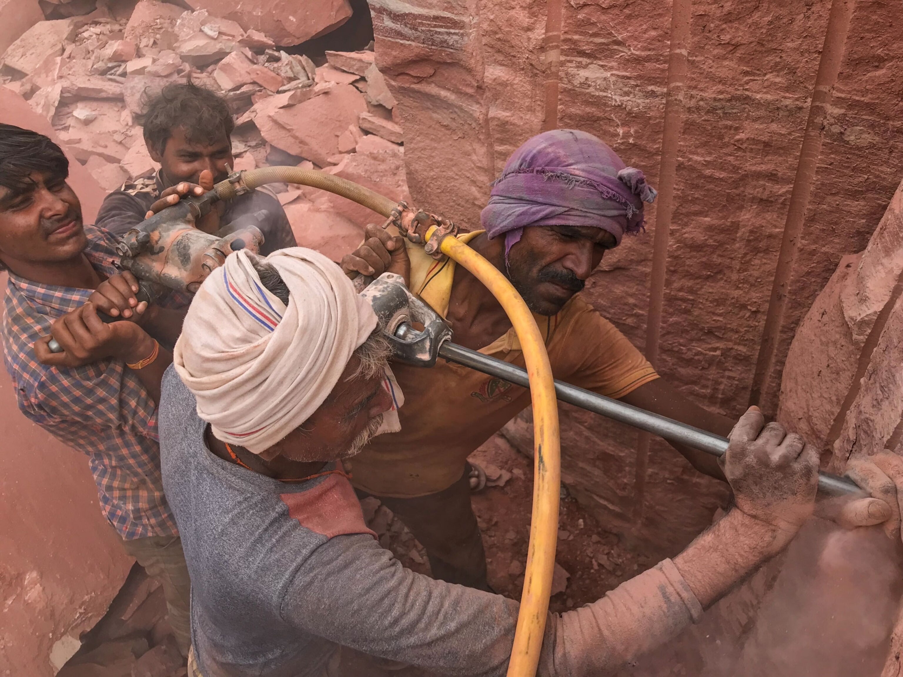 men working in a quarry in India