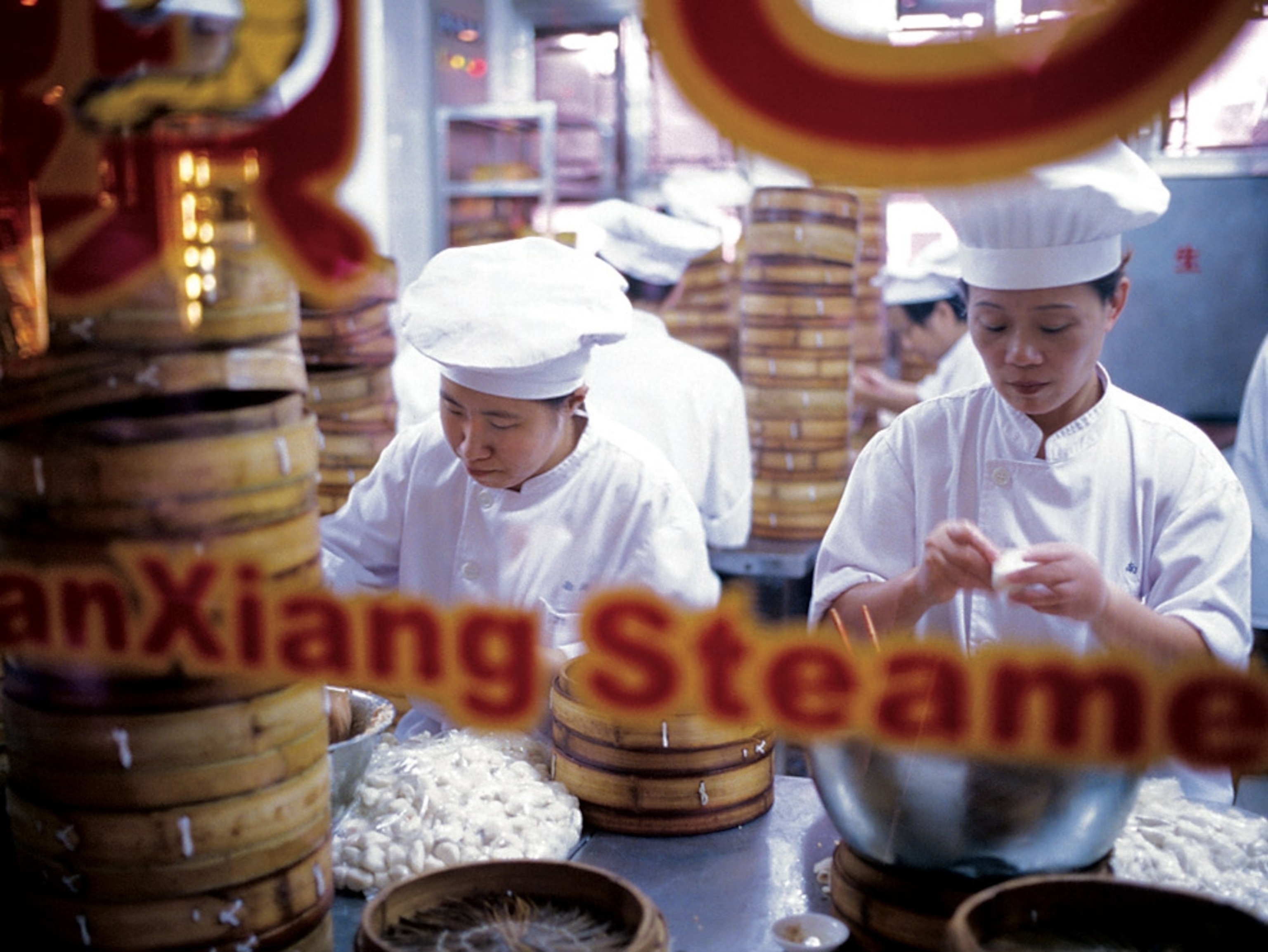Chefs making dumplings