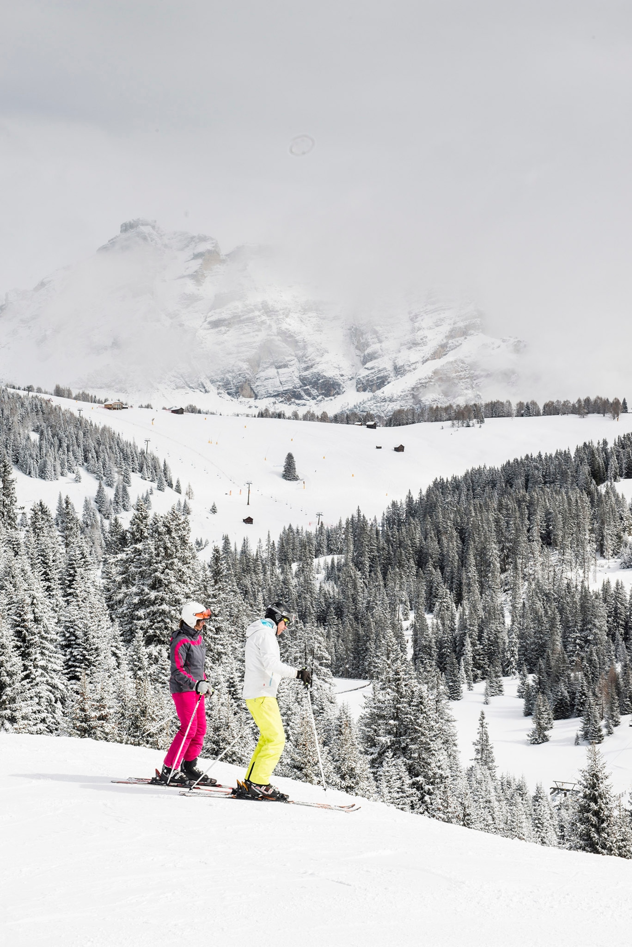 Skiers on the slopes in Alta Badia in the Dolomite Range of northeastern Italy, in March 2019.