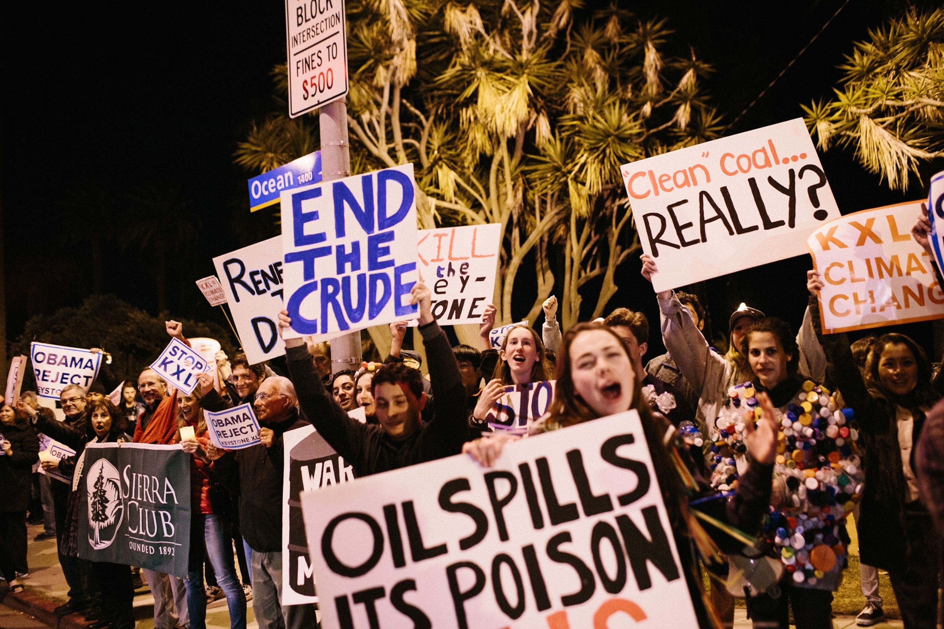 Environmental activists inflate a long balloon to mock a pipeline during a demonstration in front of the White House in Washington, DC.