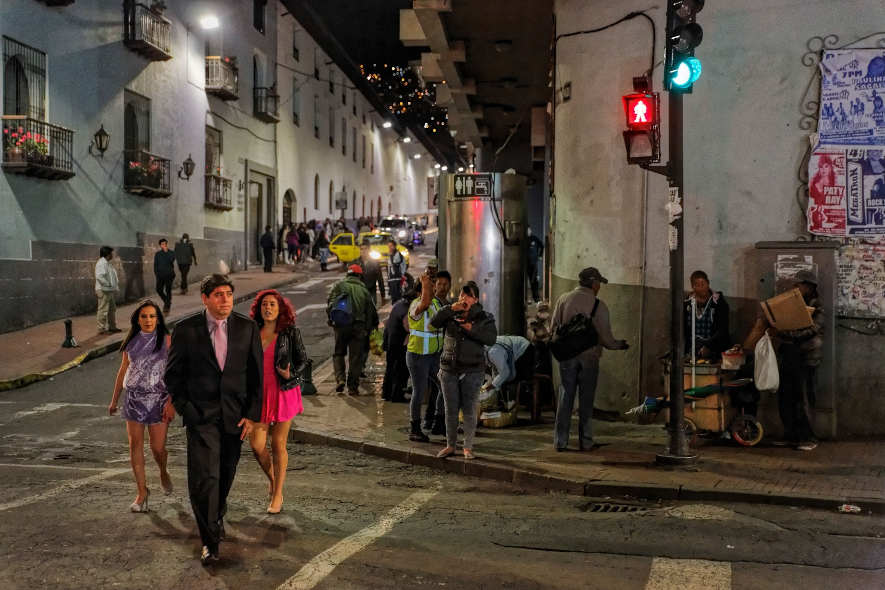 people walking down the street in Quito, Ecuador