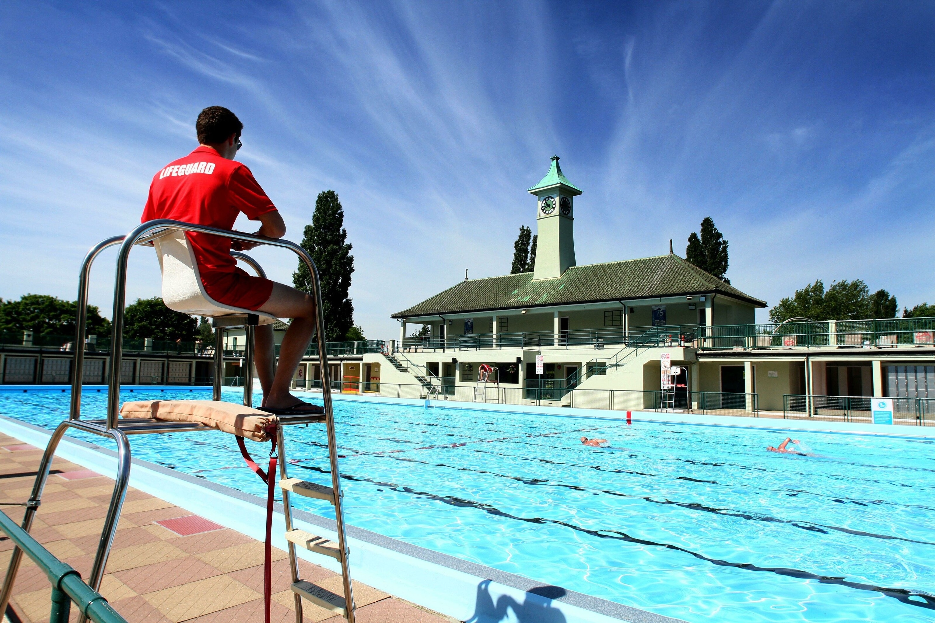 At Peterborough Lido, there's lido-themed poetry etched on to the walls, pools for kids, a sun deck and pop music playing from speakers to buoy your spirits.