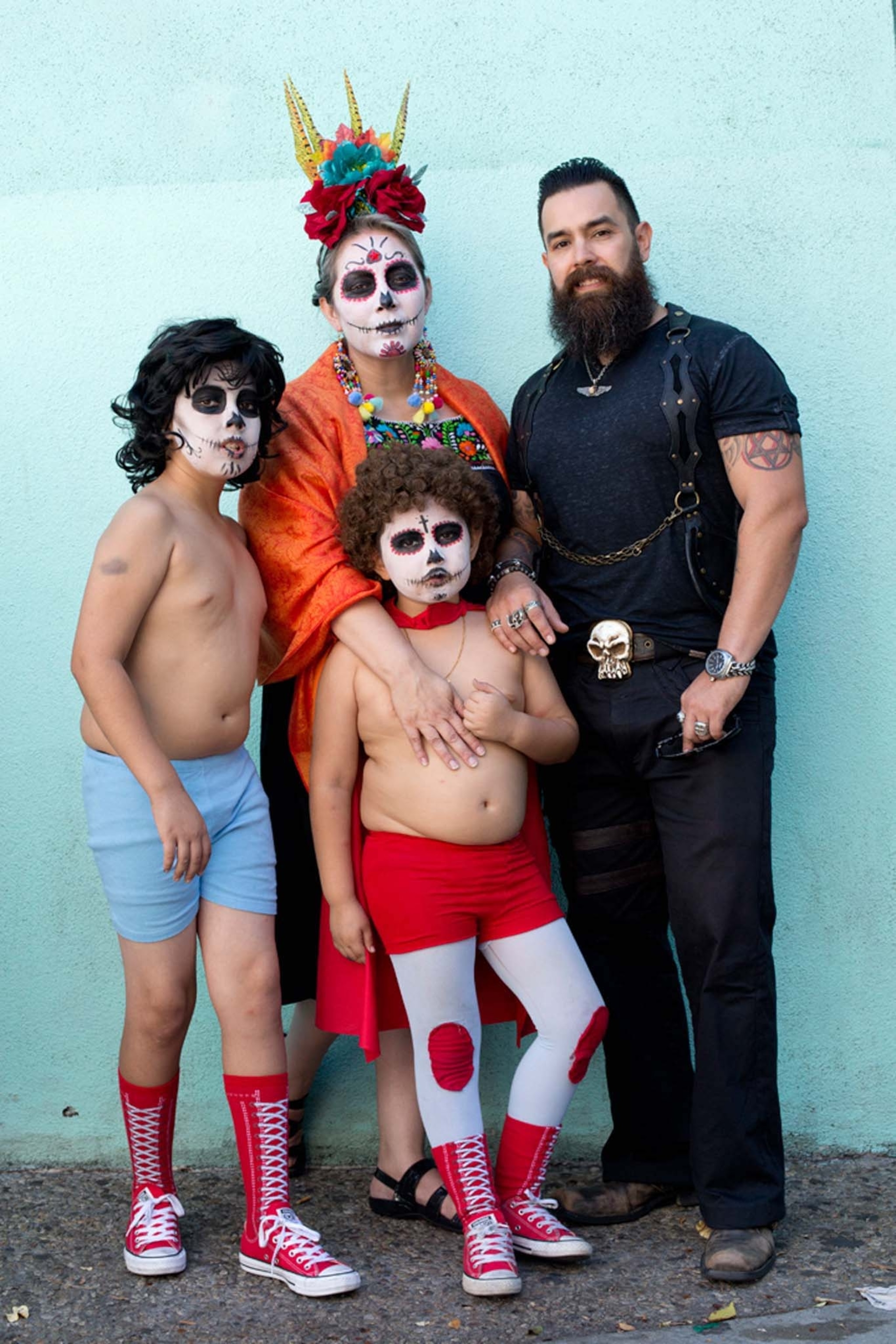 Costumed family group at the Day of the Dead festival