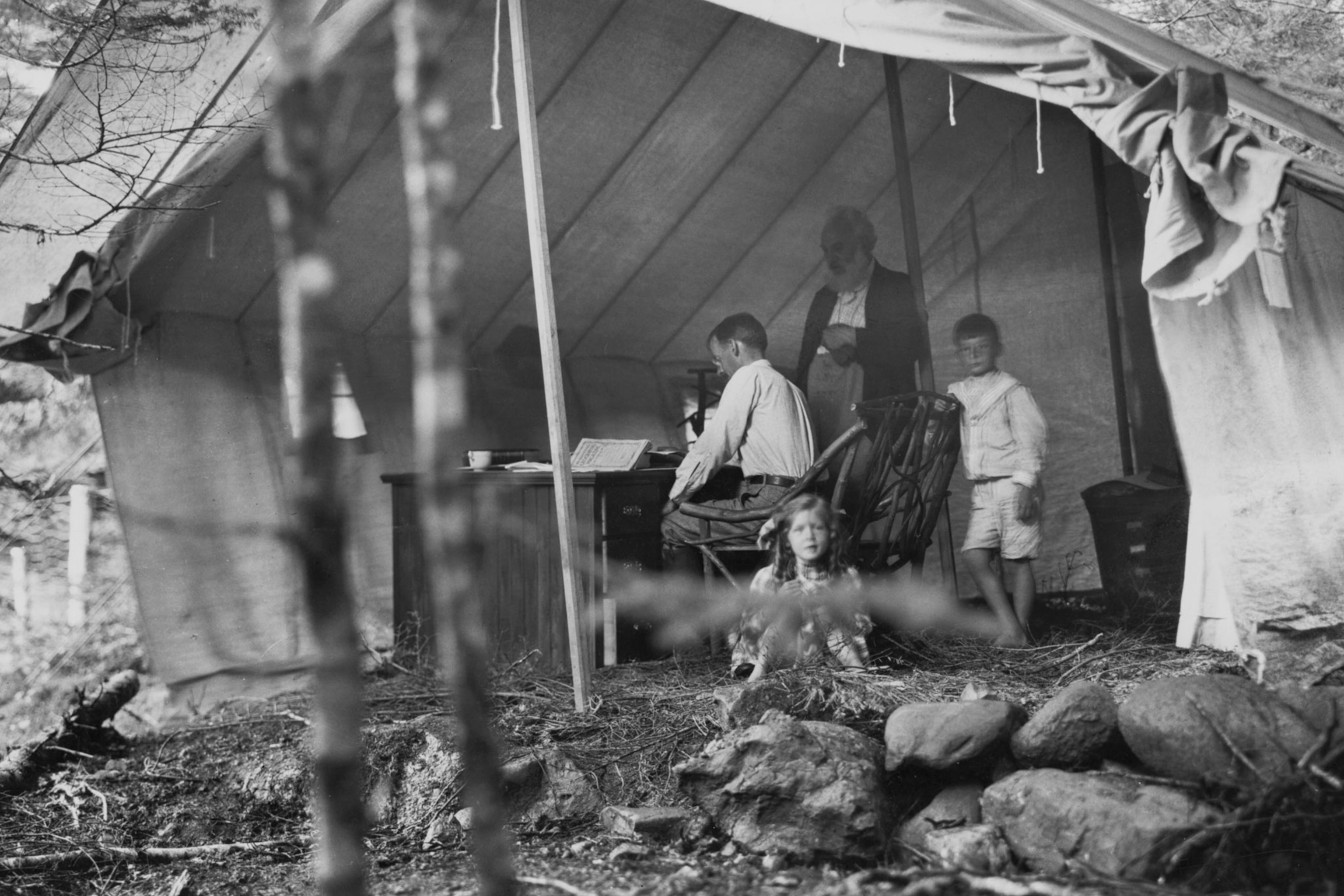 a man working in a tent