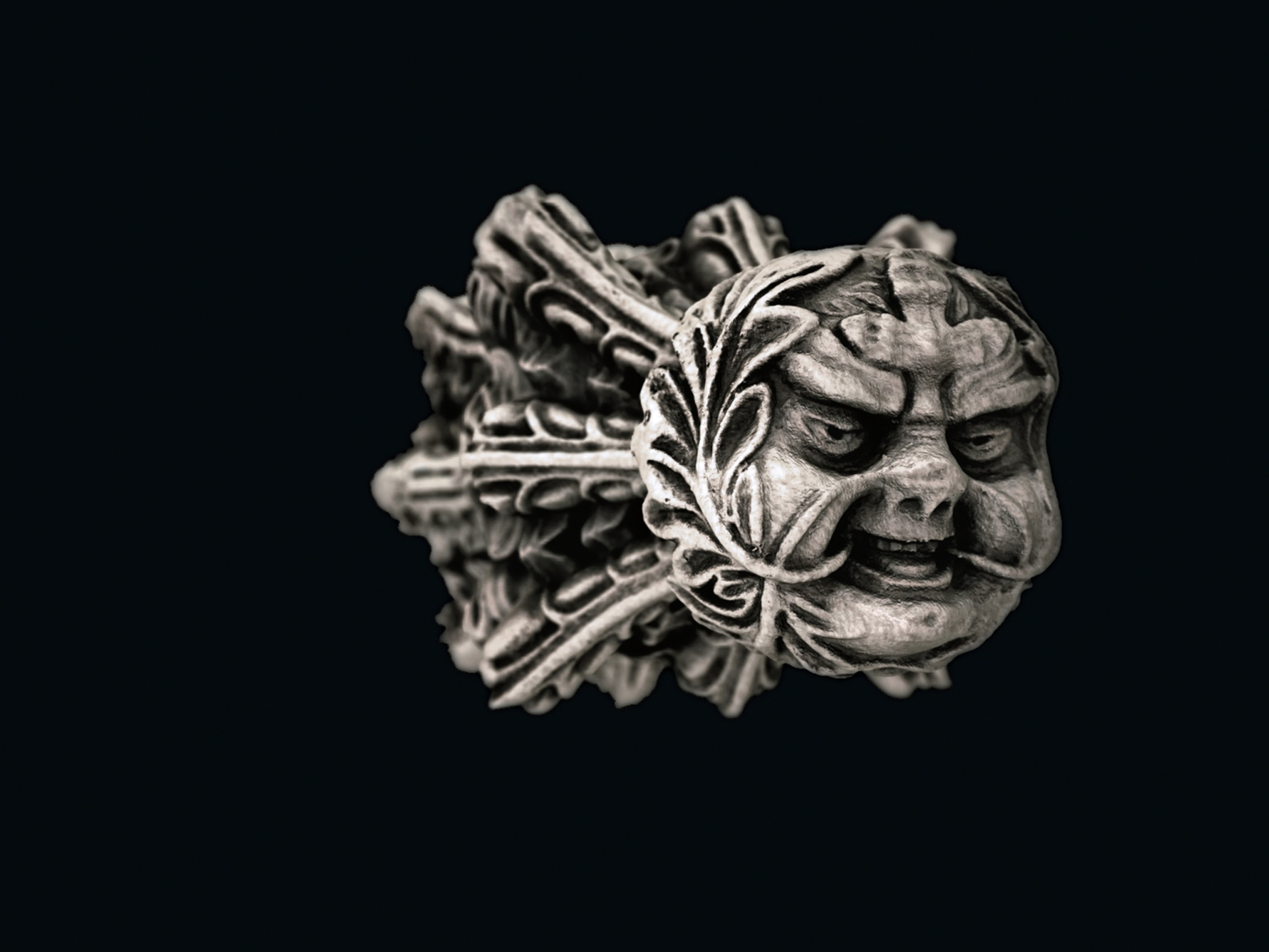 a rendering of "green man" from Scotland's Rosslyn Chapel