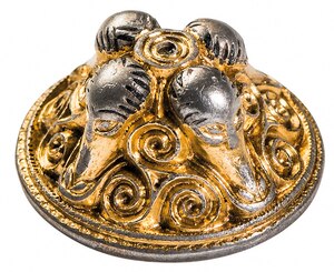 Archaeologists found this silver gilt pendant from a sheath in house 40 of the Sandby Borg site.