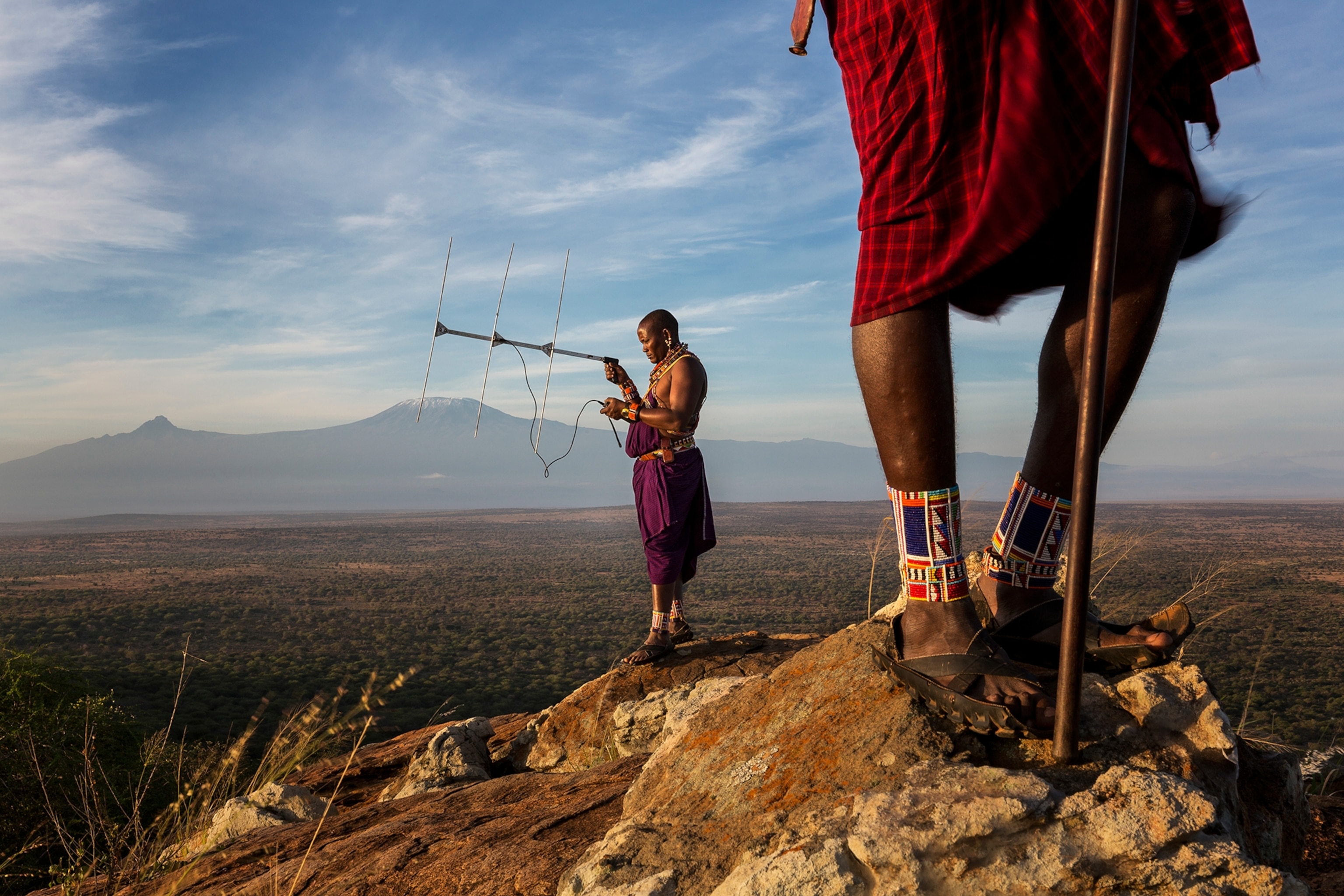 Images of "Lion Guardians" using telemetry to locate lions in the ecosystem outside of Amboselli National Park, Kenya, Feb., 23, 2013. Lion guardians is a conservation program which recruits leading Maasai men, many of whom are former lion killers, into a system which monitors lions, confers a sense of ownership and pride in them and forms a Maasai vanguard which seeks to prevent other Maasai from hunting lions in retribution for cattle killing.