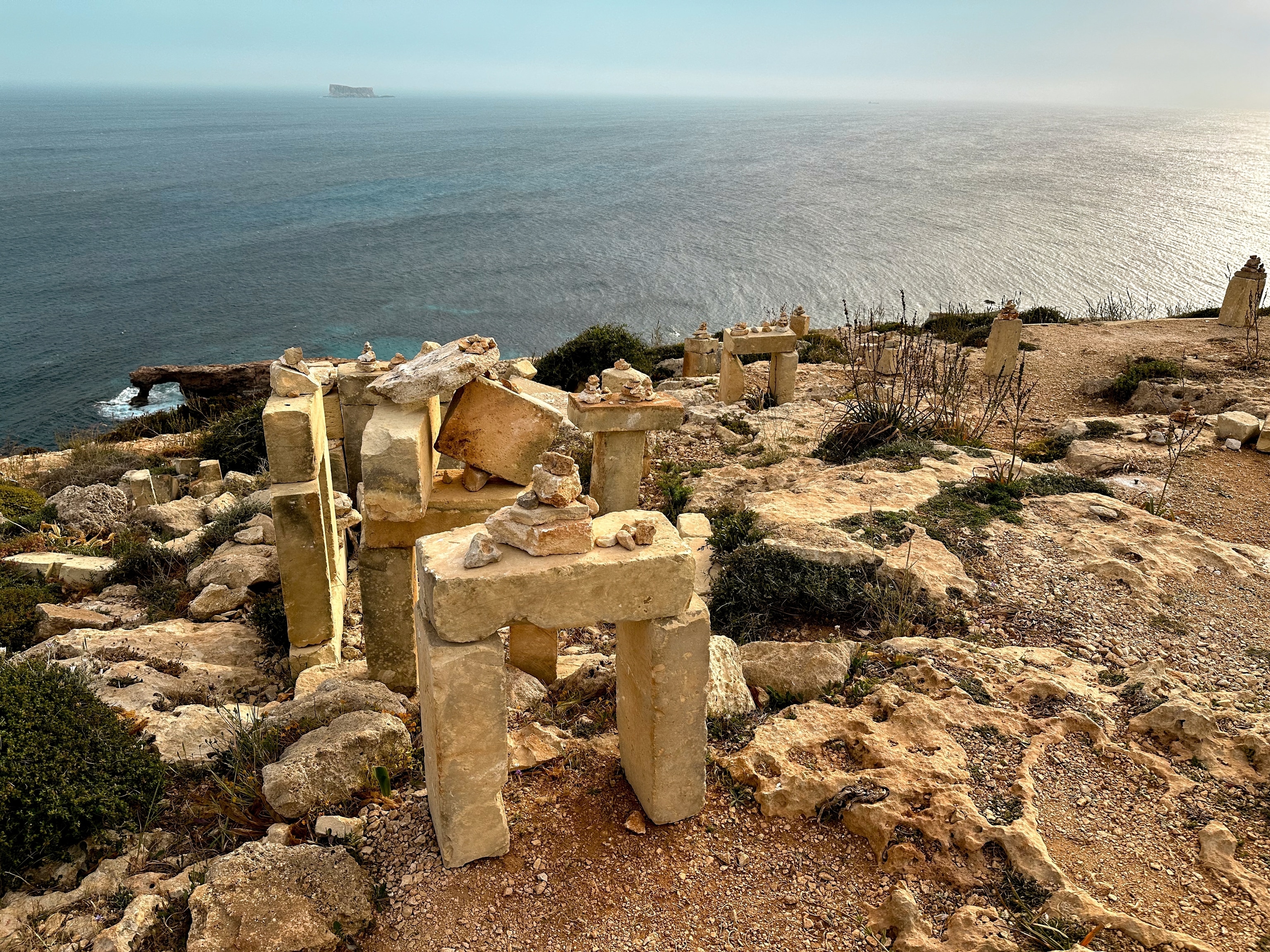 A wide view of a landscape with stones slabs.