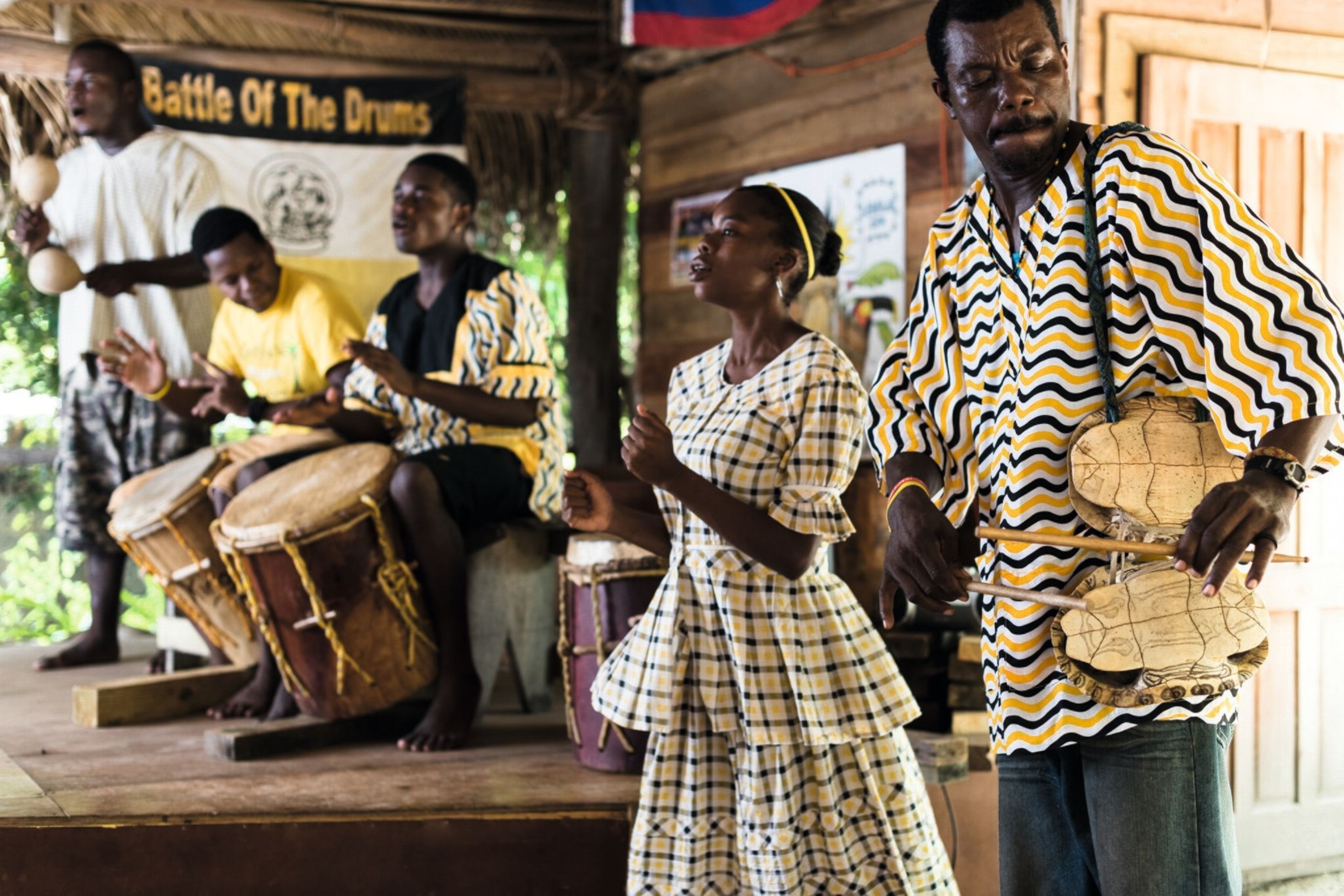 A band drumming and dancing.