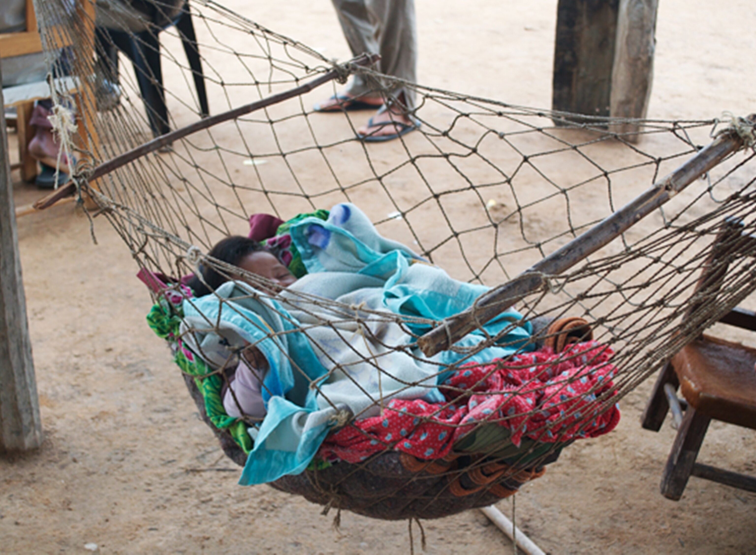 toba/qom baby in hammock