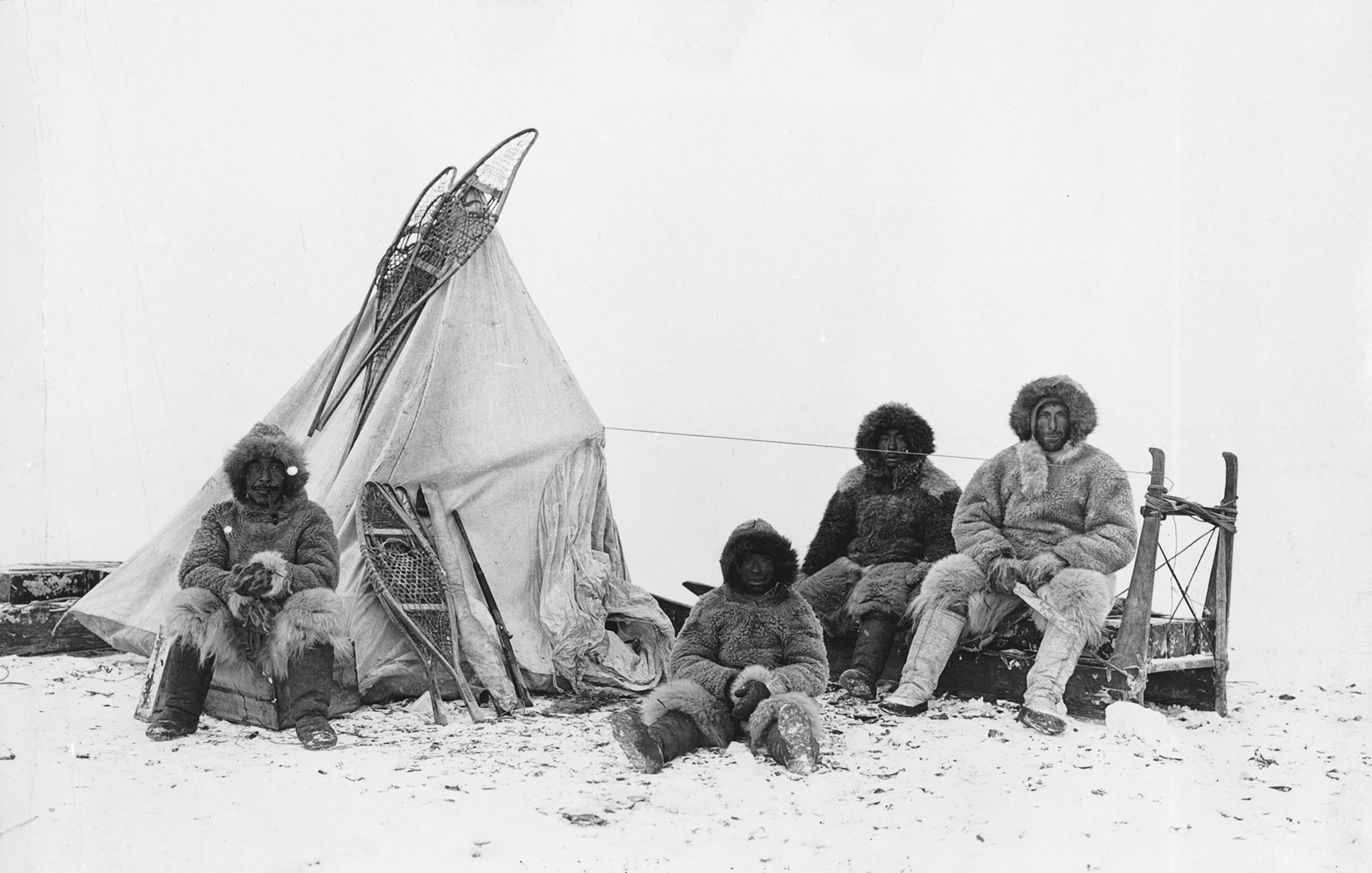 Men next to tent in Arctic
