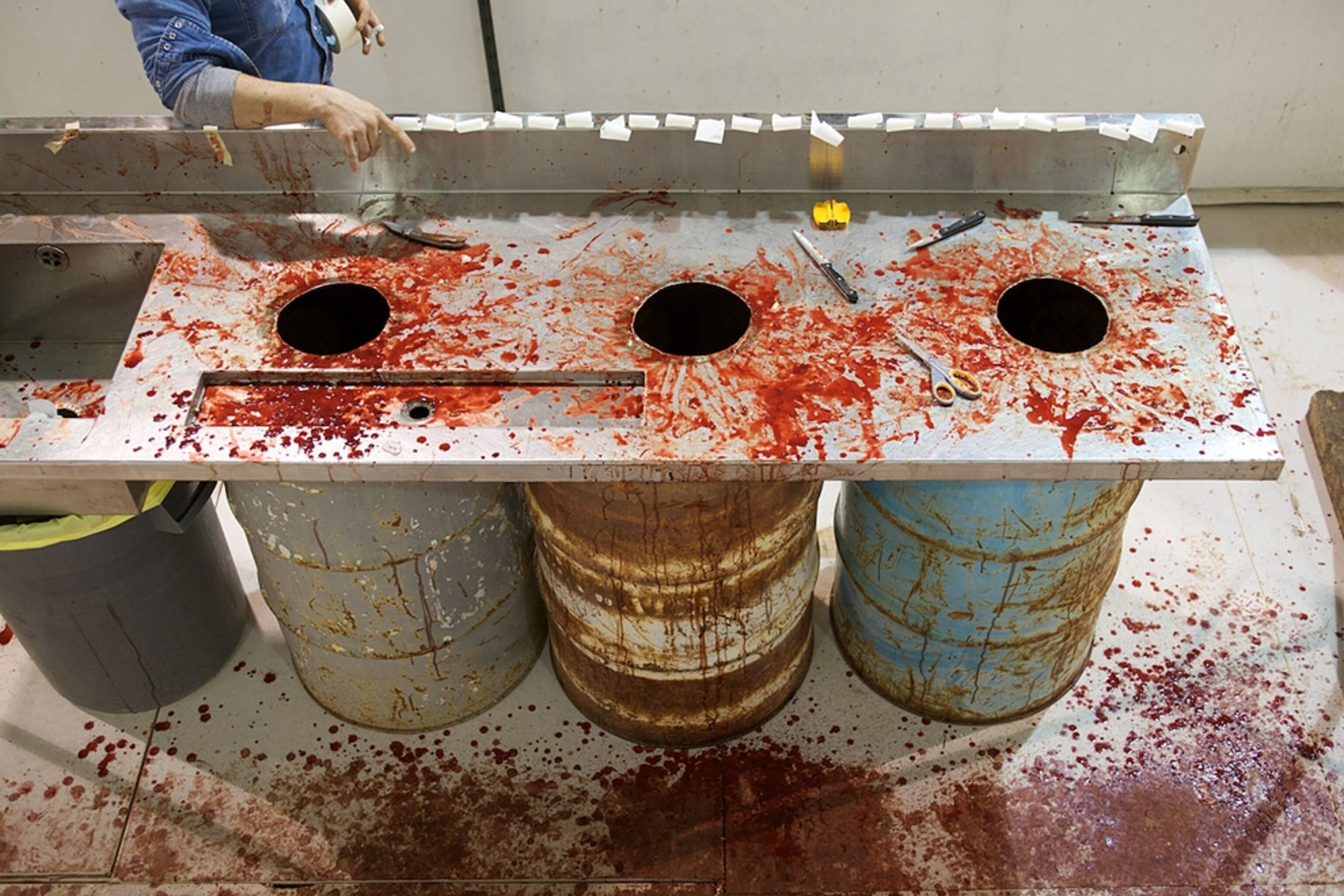 Blood-splattered counter and buckets