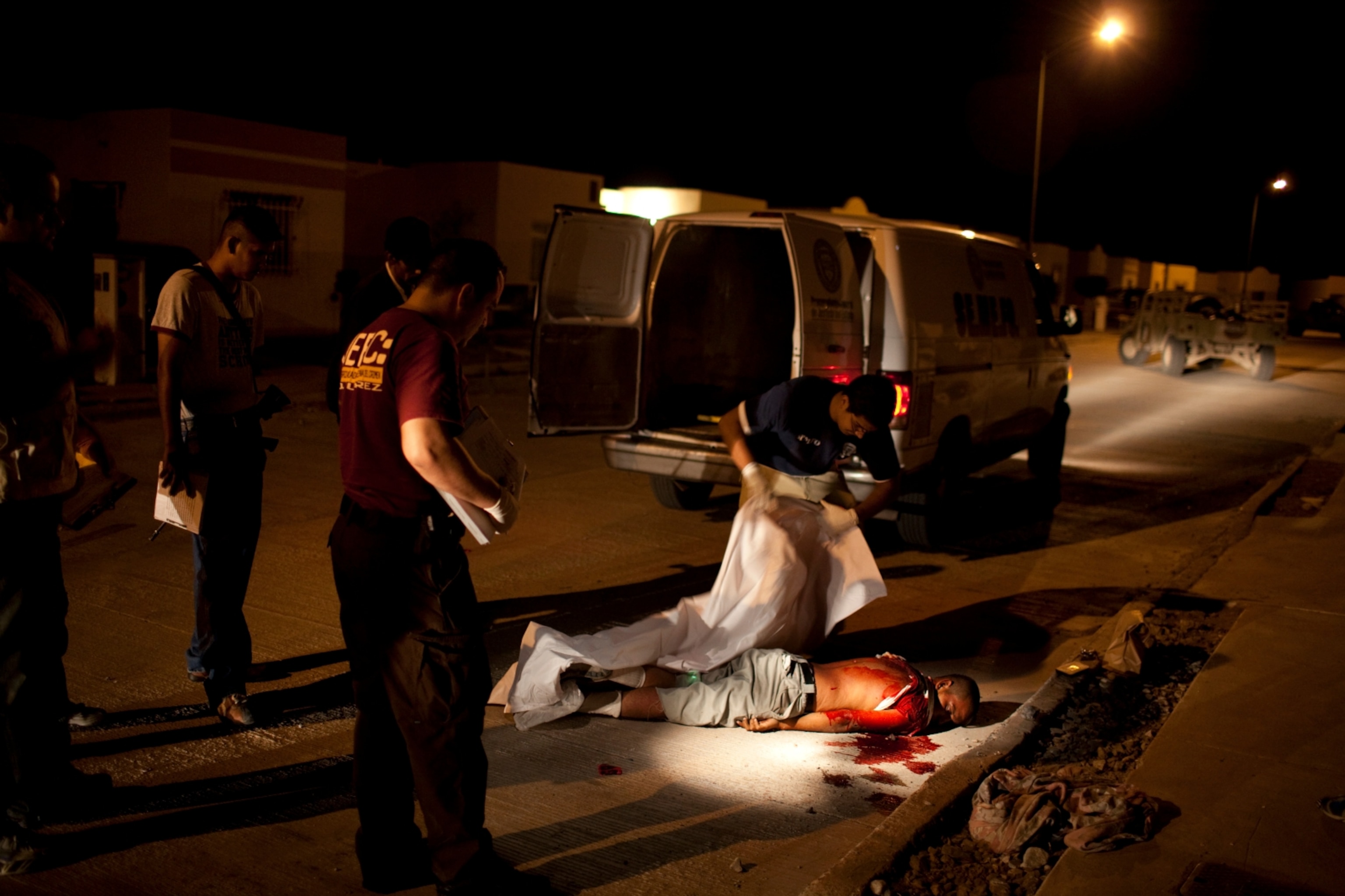 A young man is found shot to death in a residential neighborhood in Palomas, Mexico, on August 3, 2009. Palomas is a small town of about 7,500 people, located just west of Juarez along the border with Columbus, New Mexico.