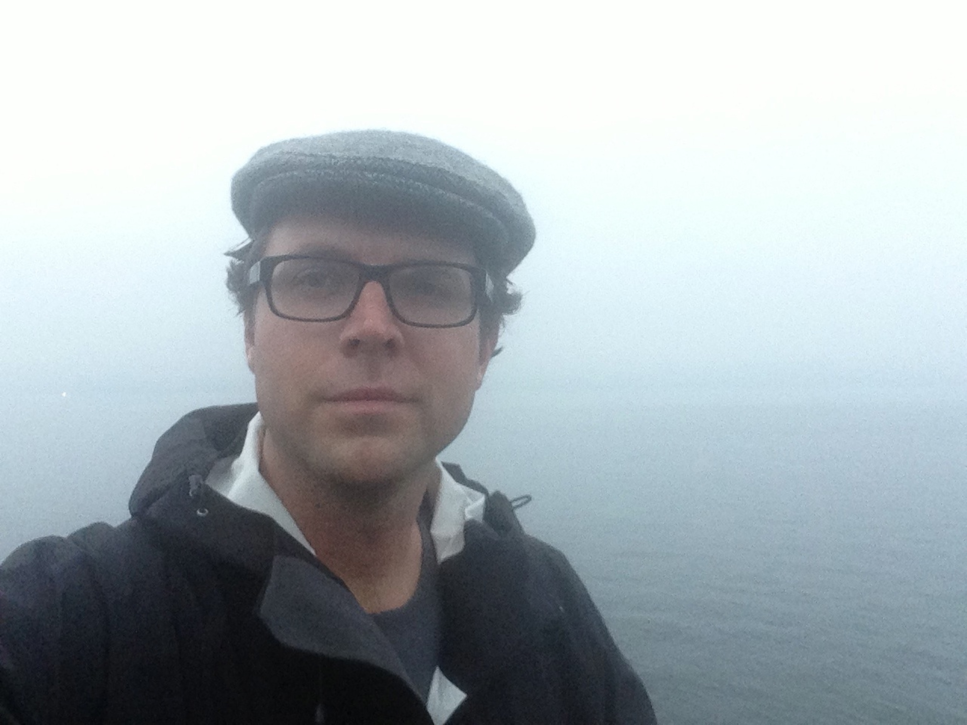 Standing on the boat dock in Greenock, where my great-great-great grandfather left Scotland more than 150 years ago. (Photo by Andrew Evans, National Geographic Traveler)