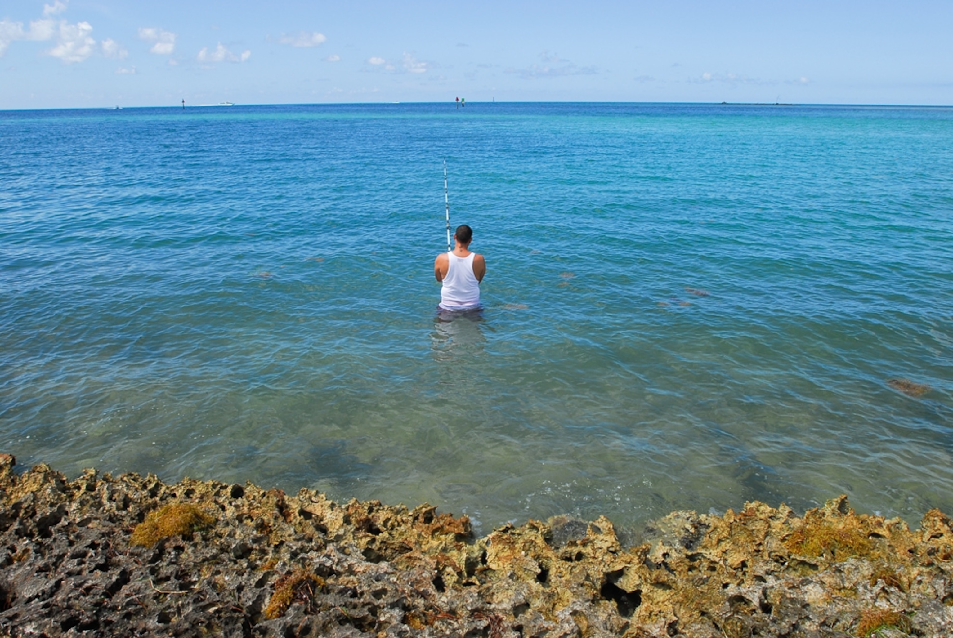 A man fishes in Biscayne National Park, one of the U.S. national parks that may be threatened by the Gulf oil spill.