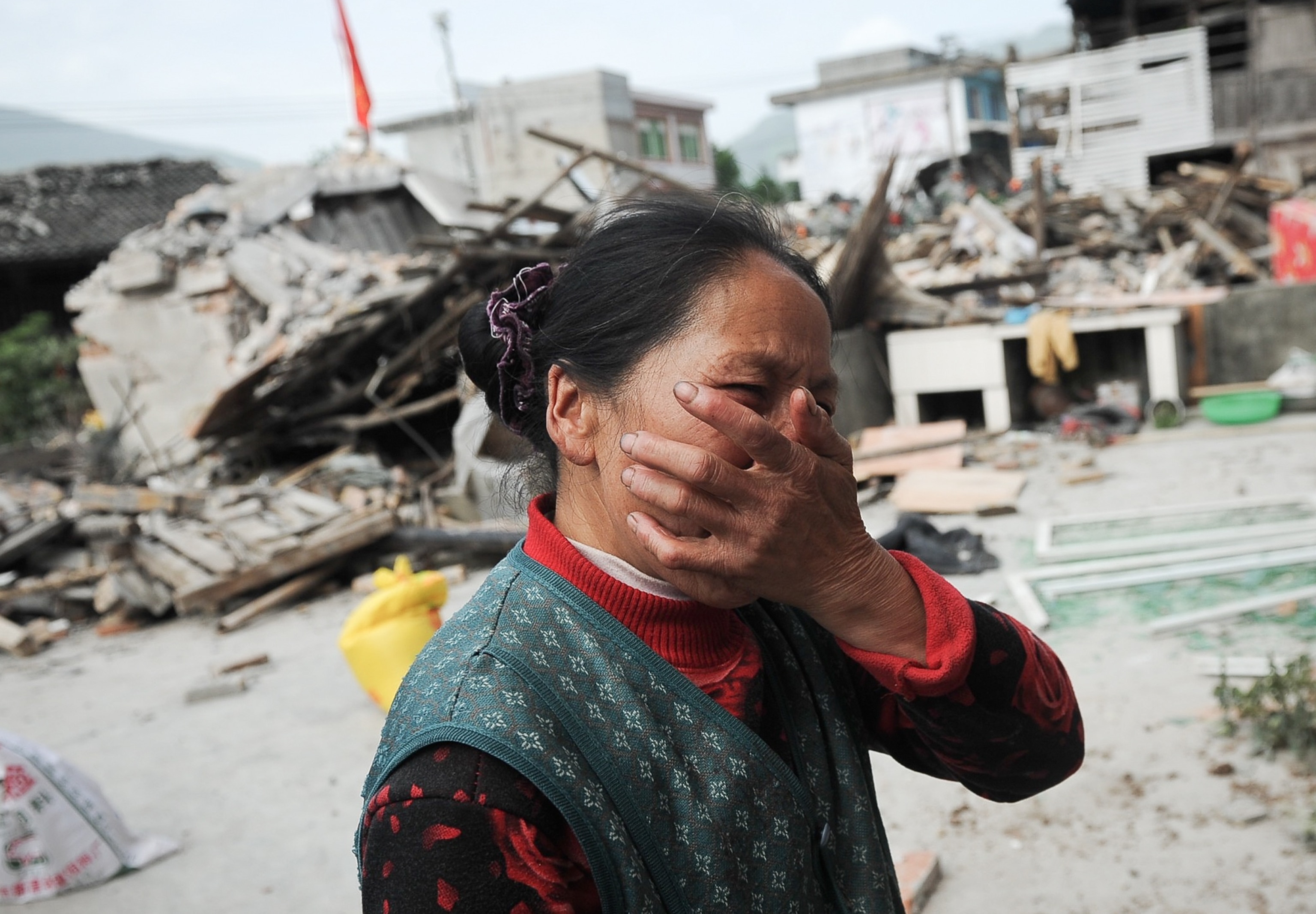 China earthquake picture: A victim reacts