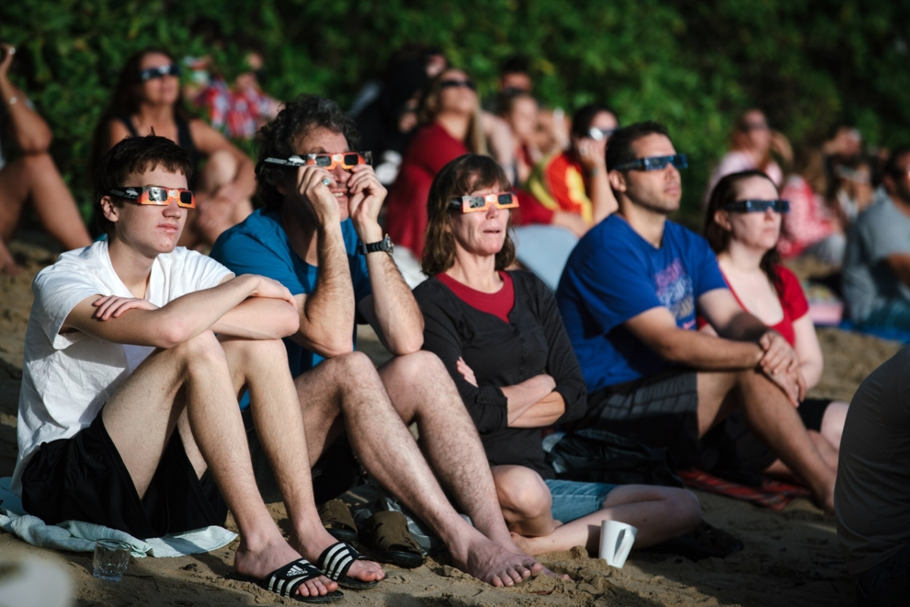 people watching the solar eclipse