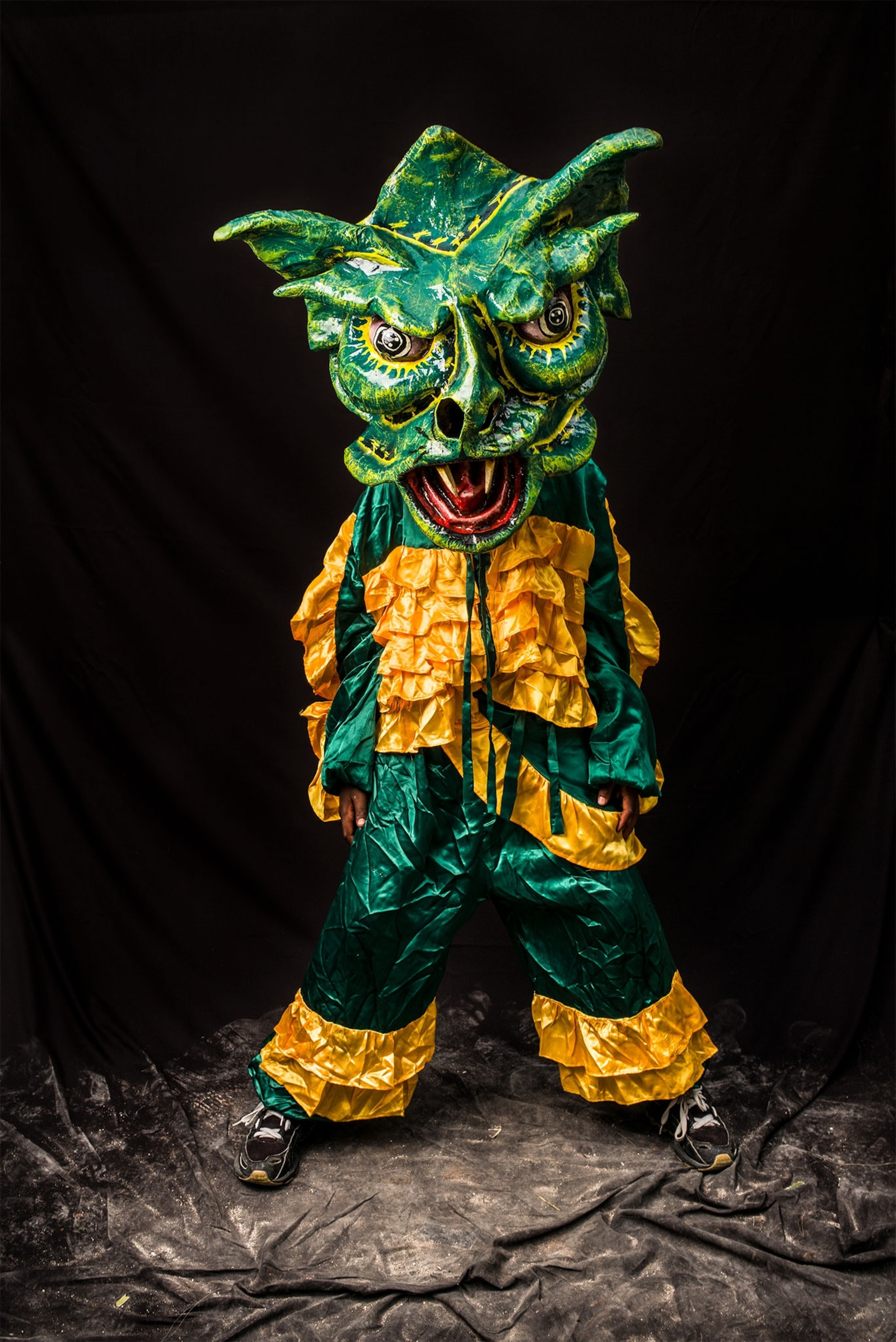 a person in a green costume