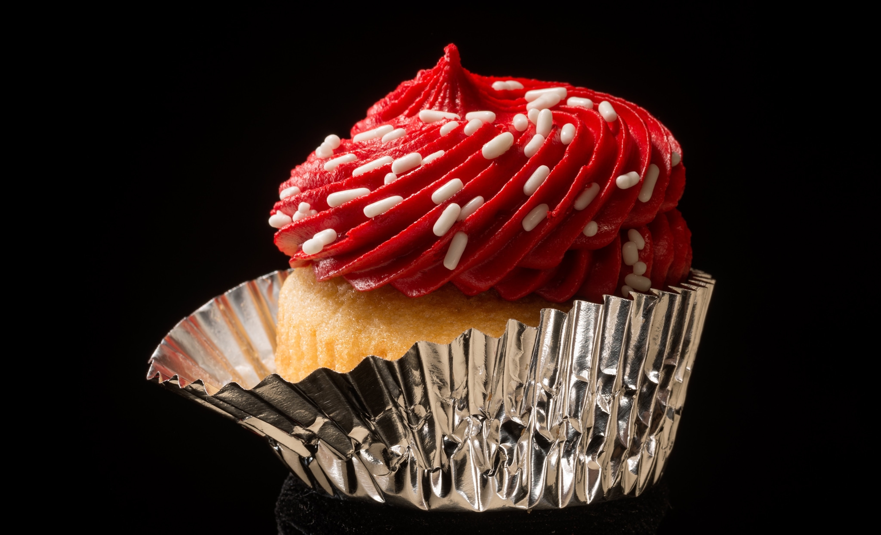 a man sitting in front of a steak dinner