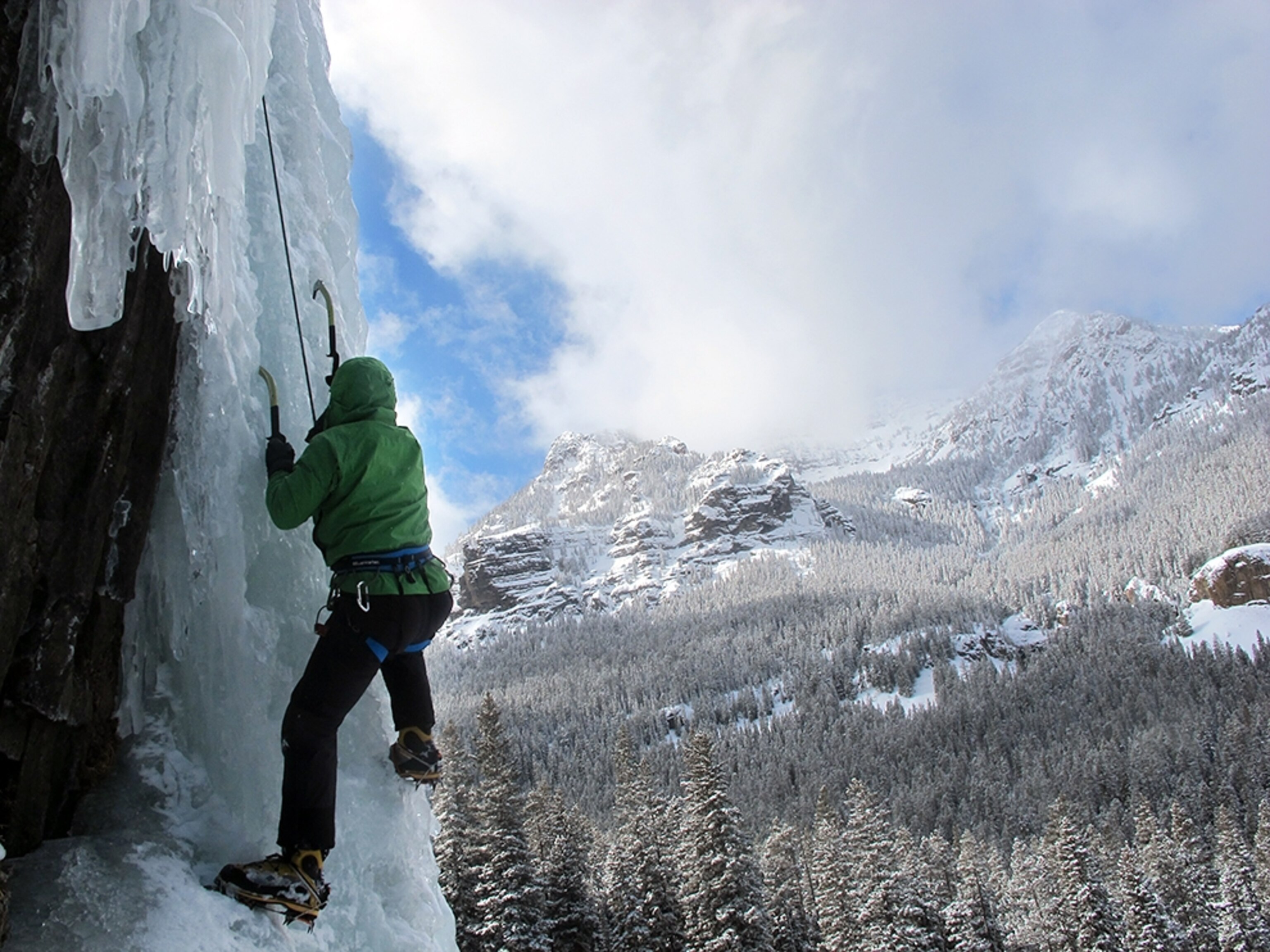 Nick Watson climbing a frozen waterfall in Hyalite Canyon, Bozeman, Montana