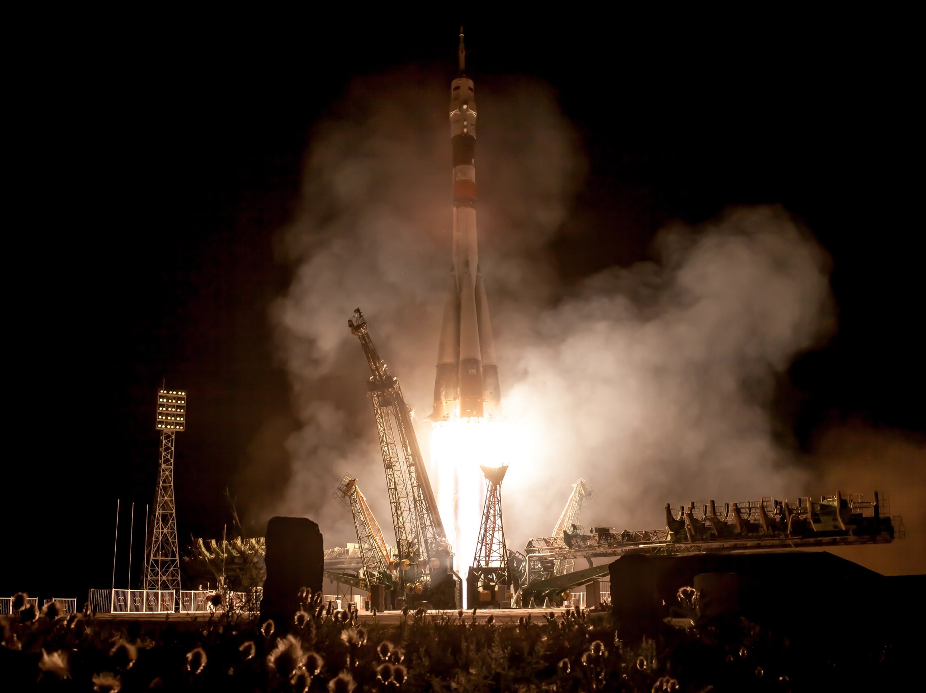 a Soyuz rocket launch ferrying an international crew to the International Space Station