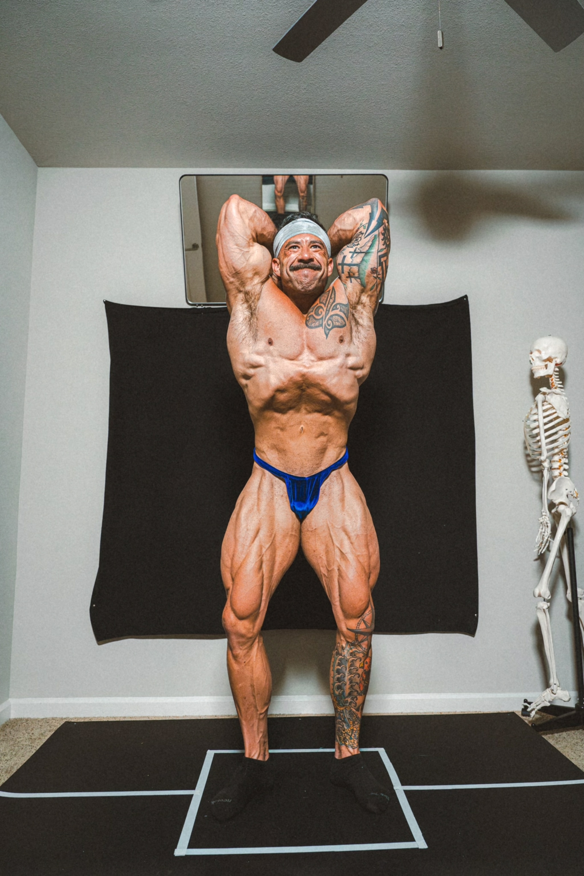 Daniel Coffeen shows off his large, well defined anterior muscles.