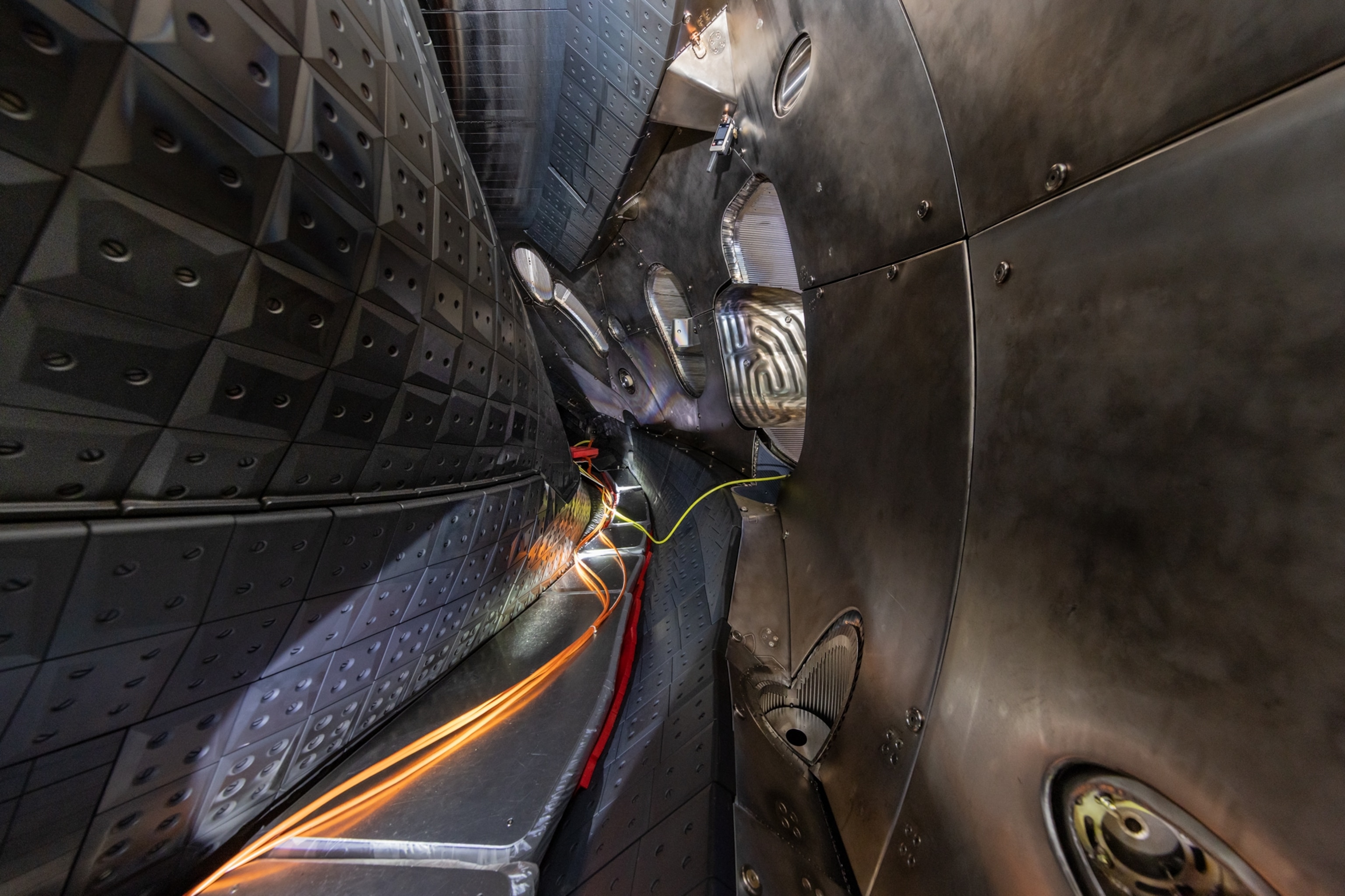 a dark tunnel with light at the end