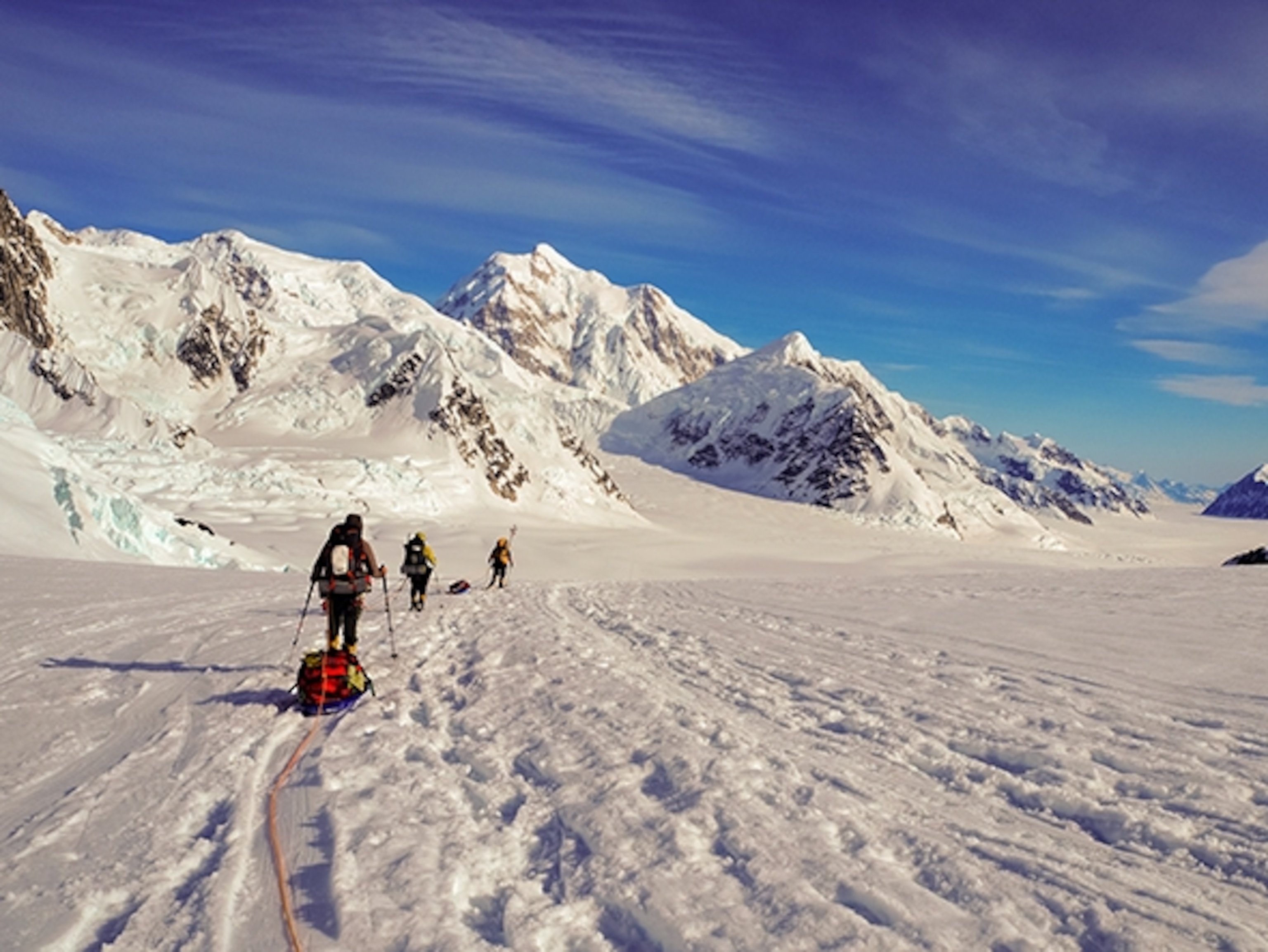 Crossing the glacier, Denali; Photograph by Chris Kassar