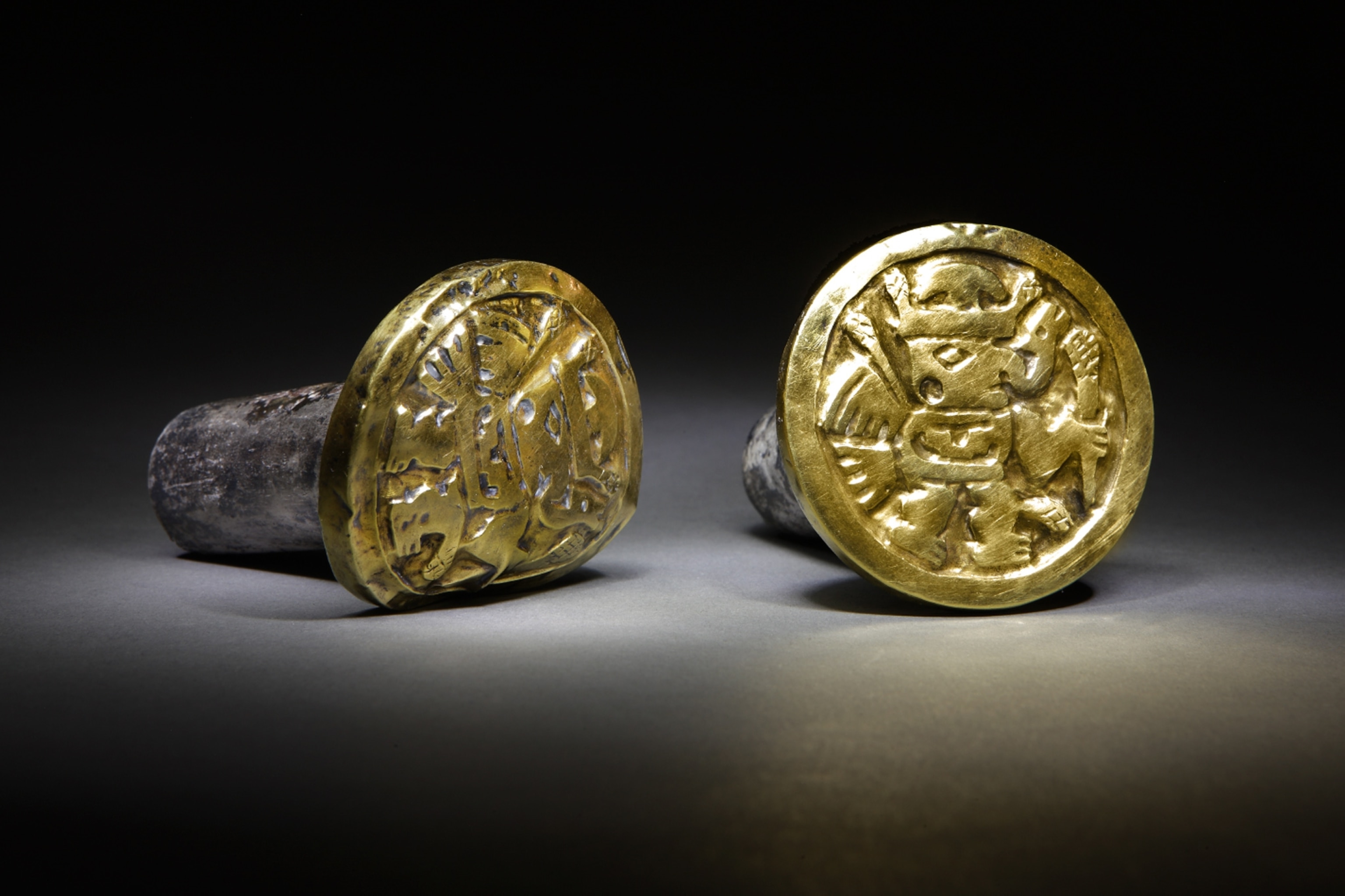 Peru Tomb - Gold and silver ear ornaments found by archaeologists.